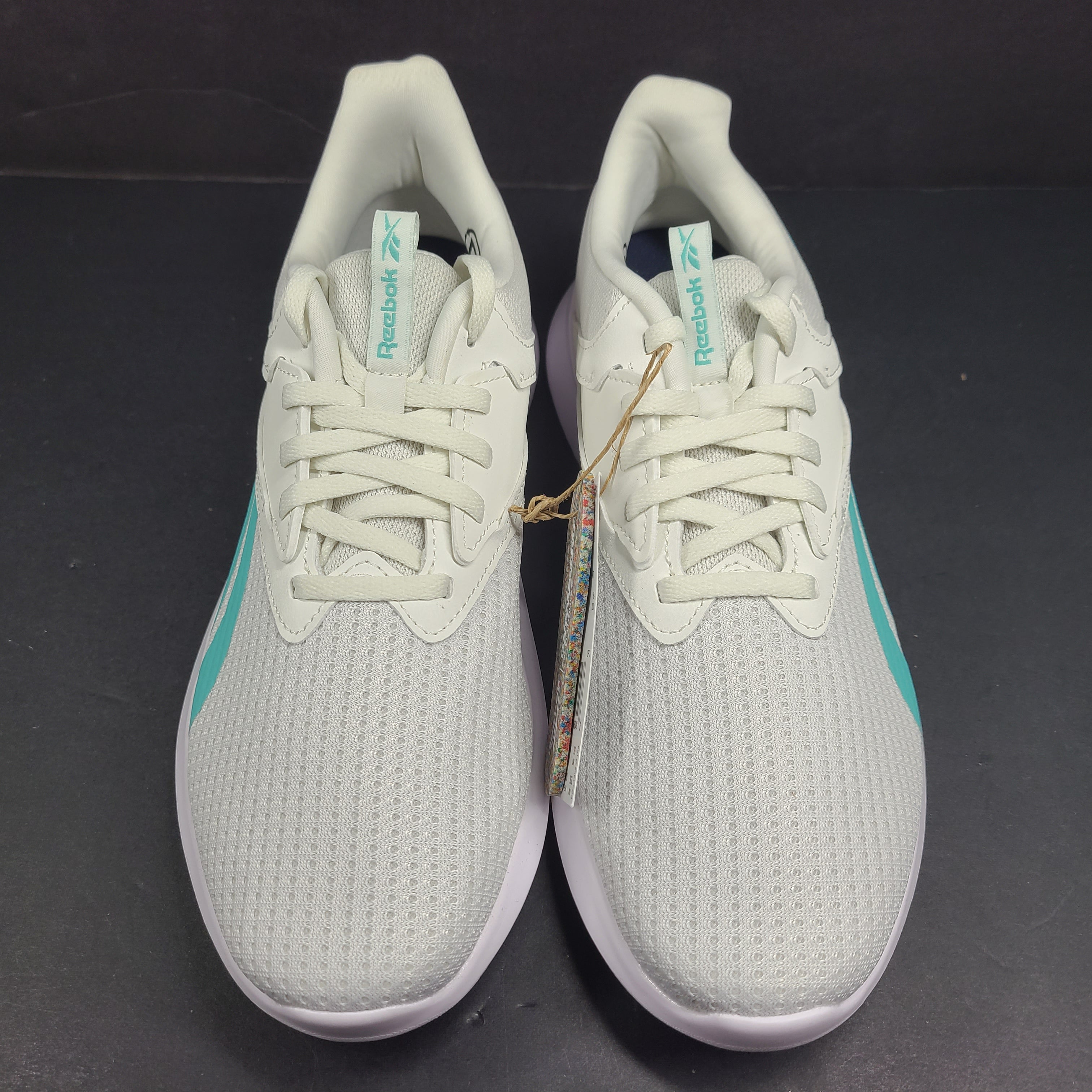 Lightweight Reebok Fluxlite training shoes in gray and teal, US size 9, built for everyday performance.