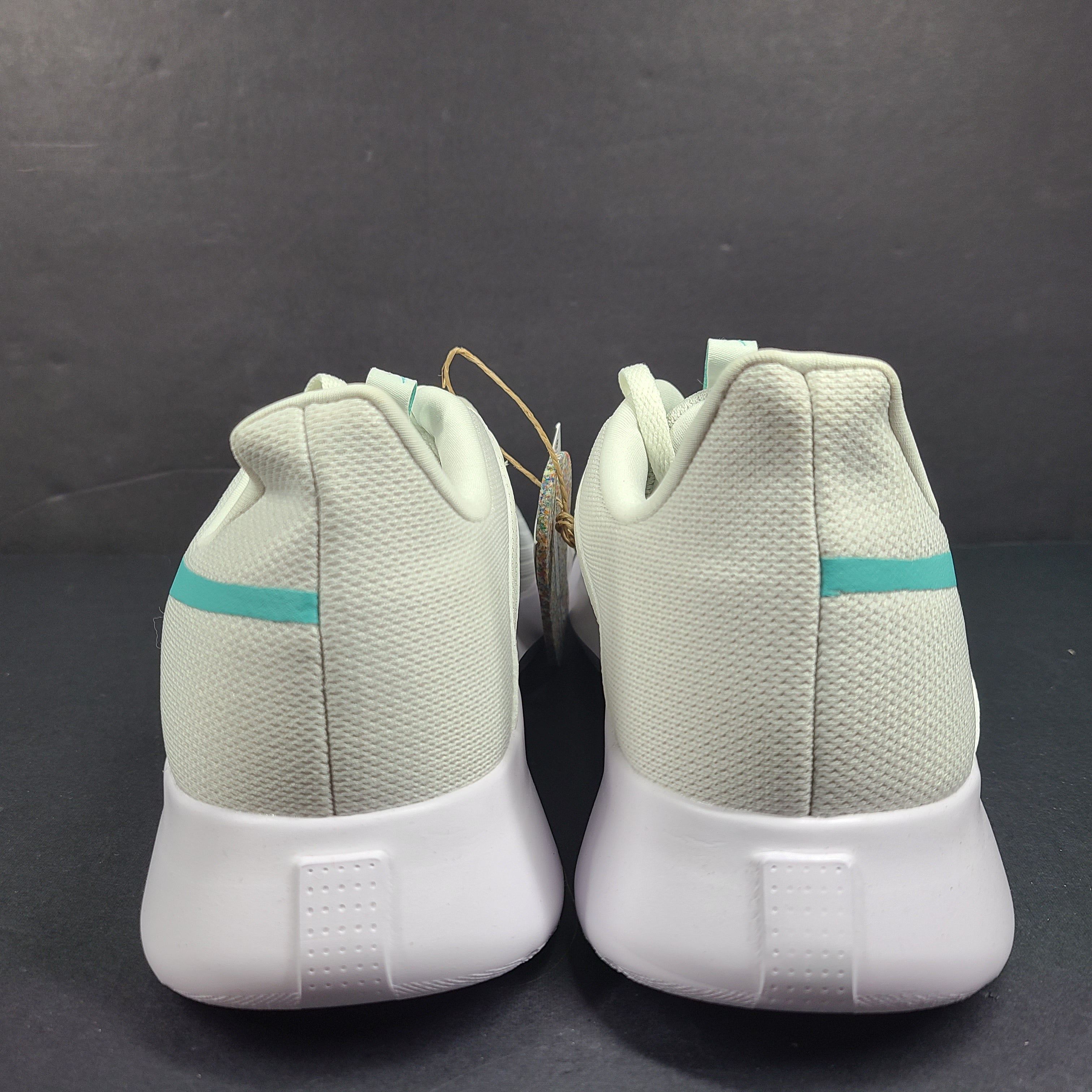 Lightweight Reebok Fluxlite training shoes in gray and teal, US size 9, built for everyday performance.
