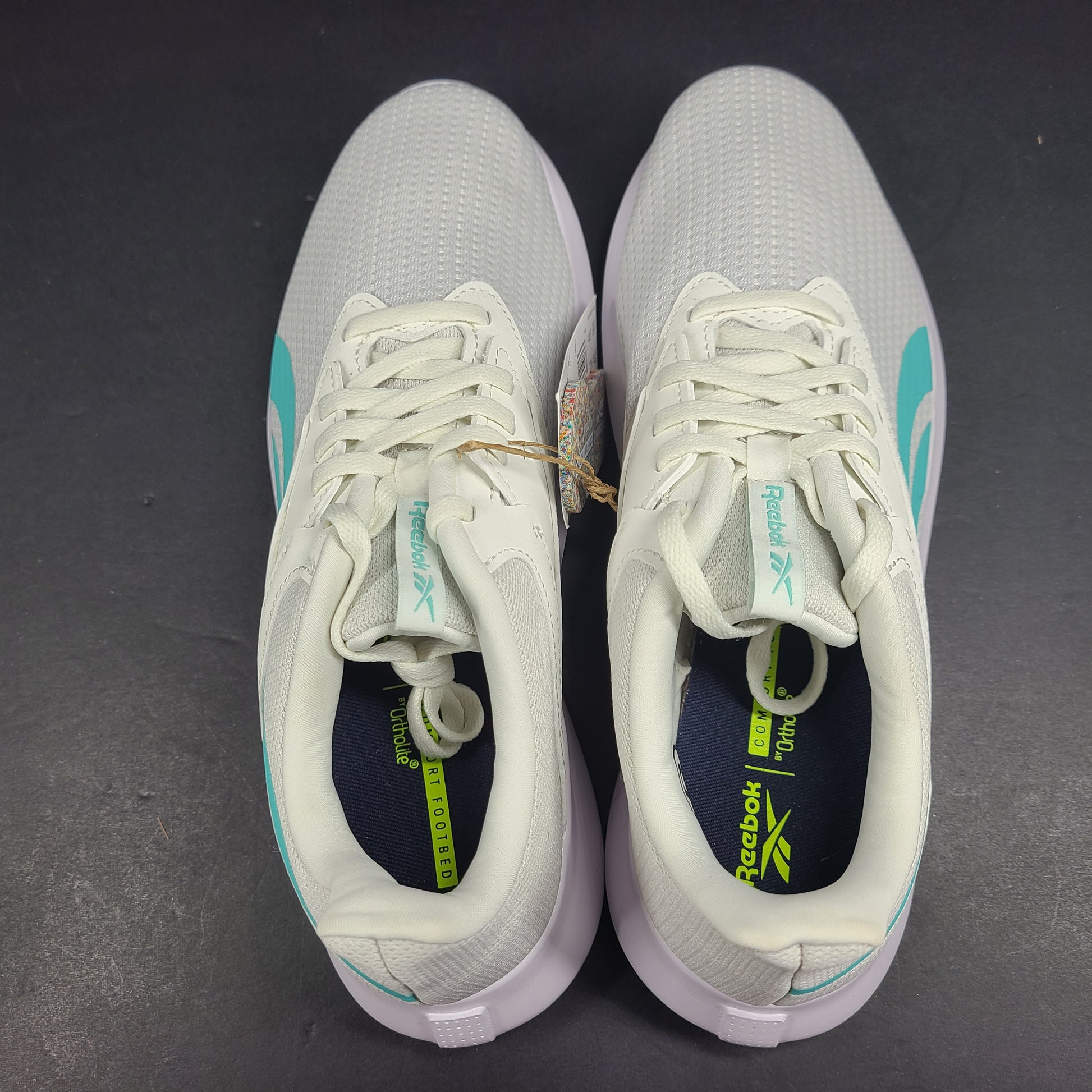 Lightweight Reebok Fluxlite training shoes in gray and teal, US size 9, built for everyday performance.