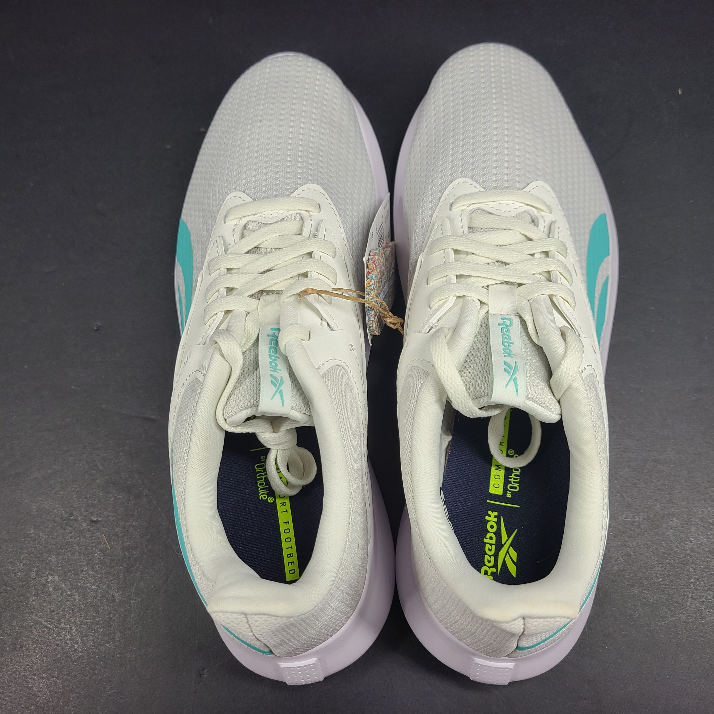 Lightweight Reebok Fluxlite training shoes in gray and teal, US size 9, built for everyday performance.