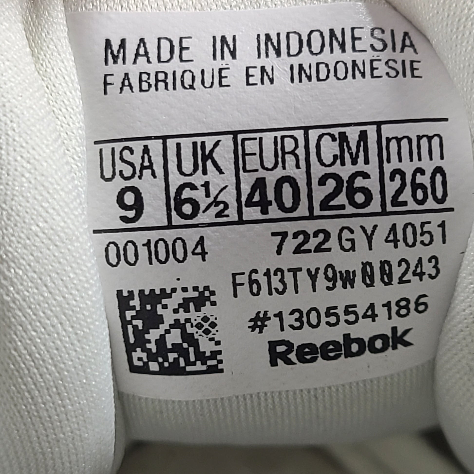 Lightweight Reebok Fluxlite training shoes in gray and teal, US size 9, built for everyday performance.