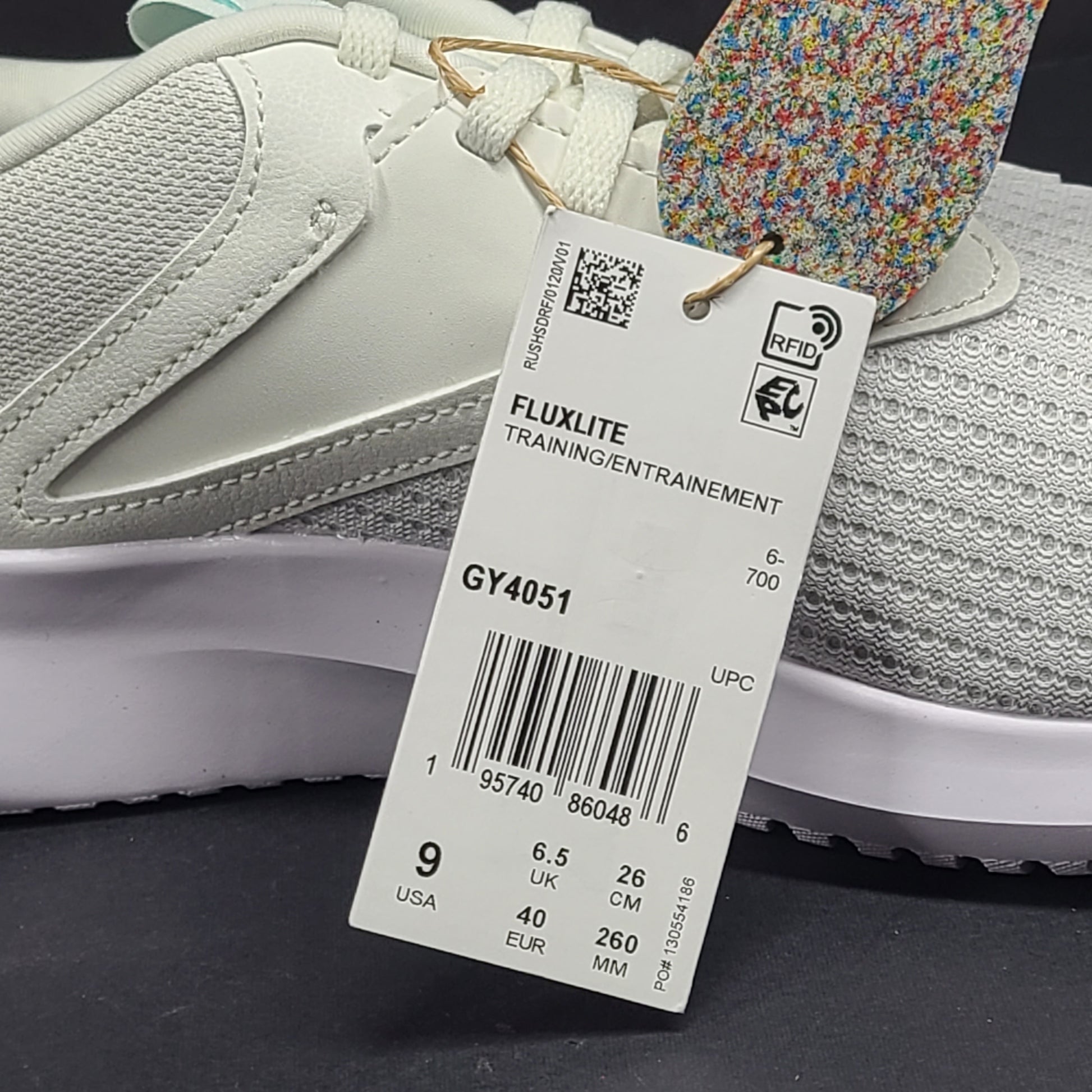 Lightweight Reebok Fluxlite training shoes in gray and teal, US size 9, built for everyday performance.