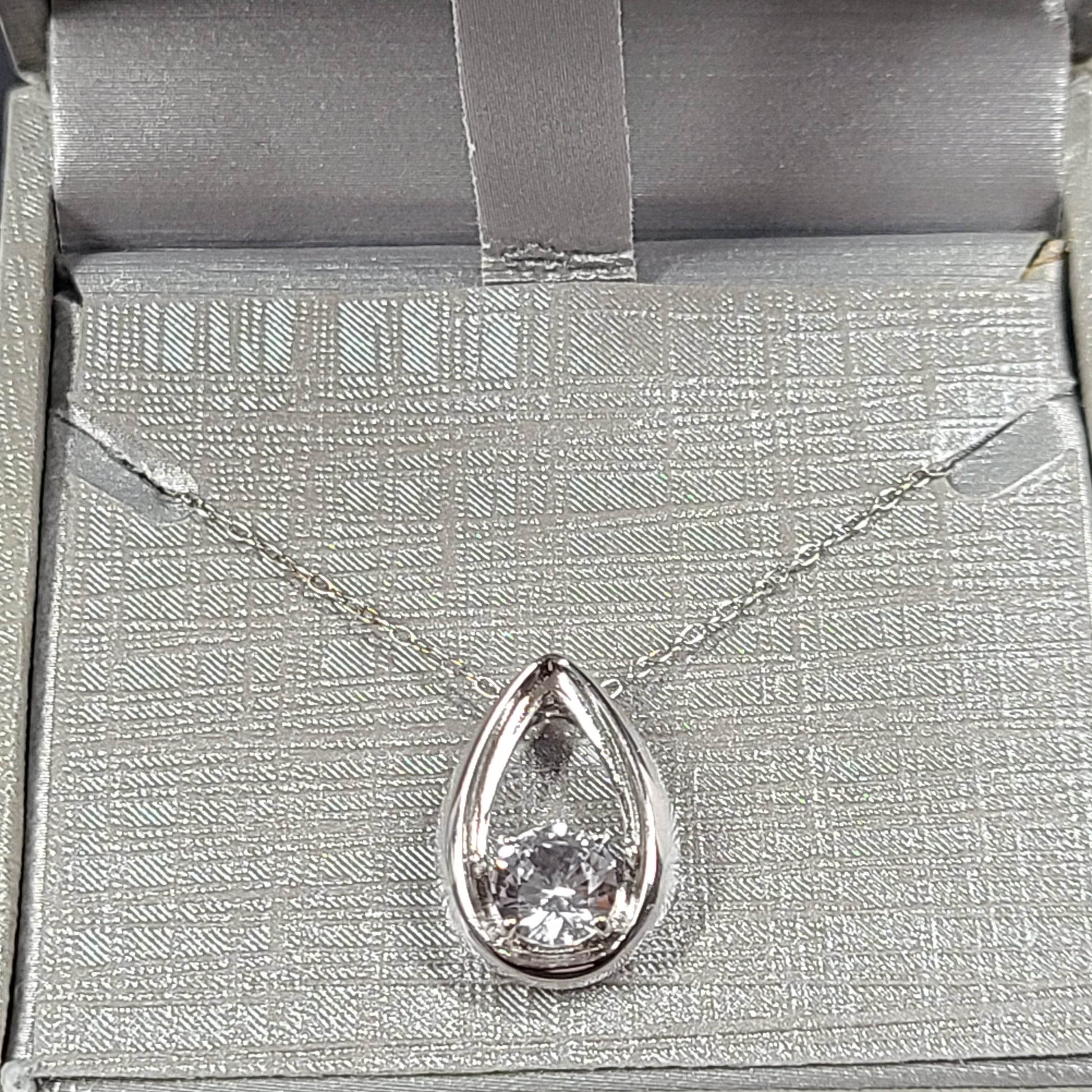 925 sterling silver teardrop pendant necklace with Italian-marked chain.