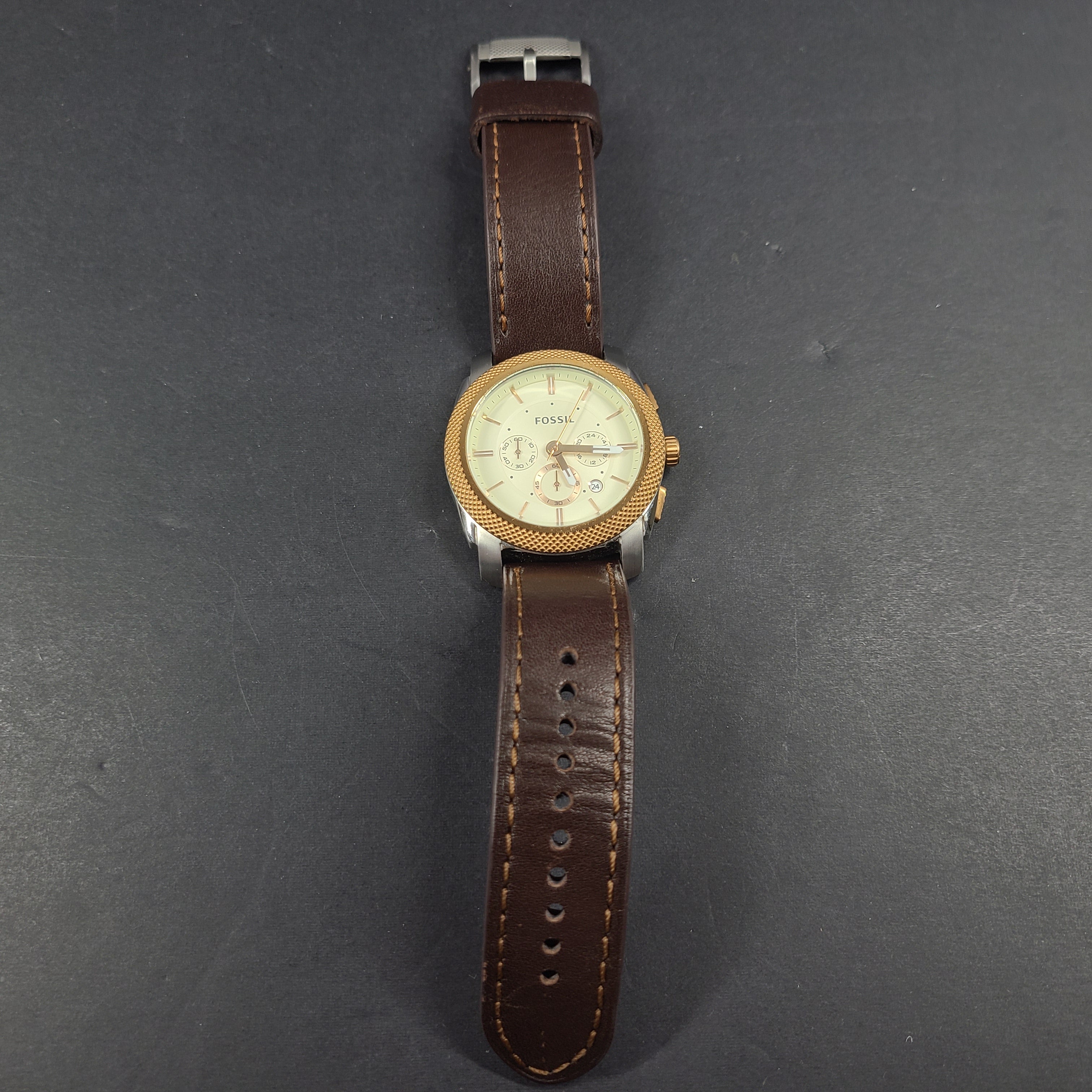 Fossil FS5040 Machine two-tone chronograph with brown leather strap and stainless steel case.