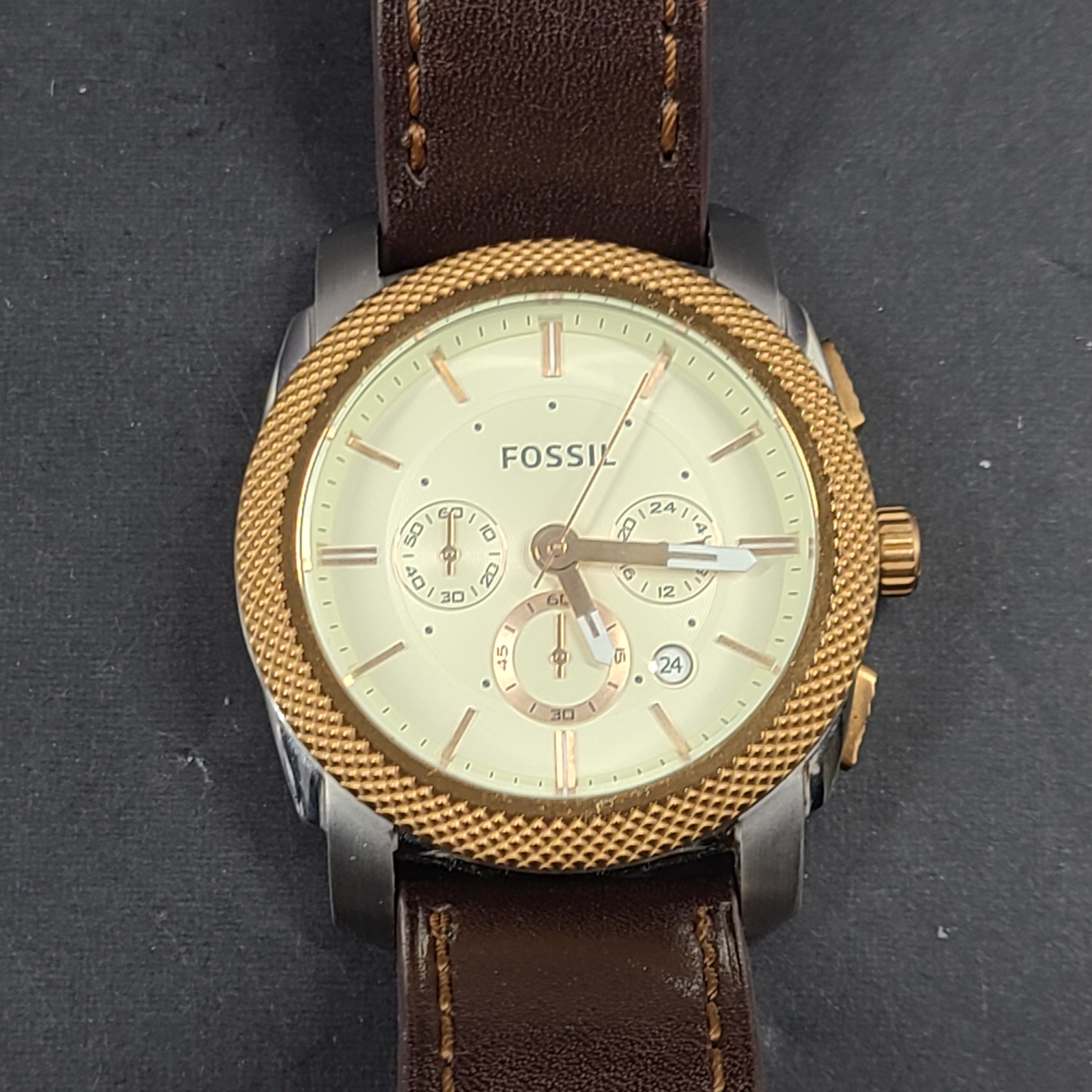 Fossil FS5040 Machine two-tone chronograph with brown leather strap and stainless steel case.