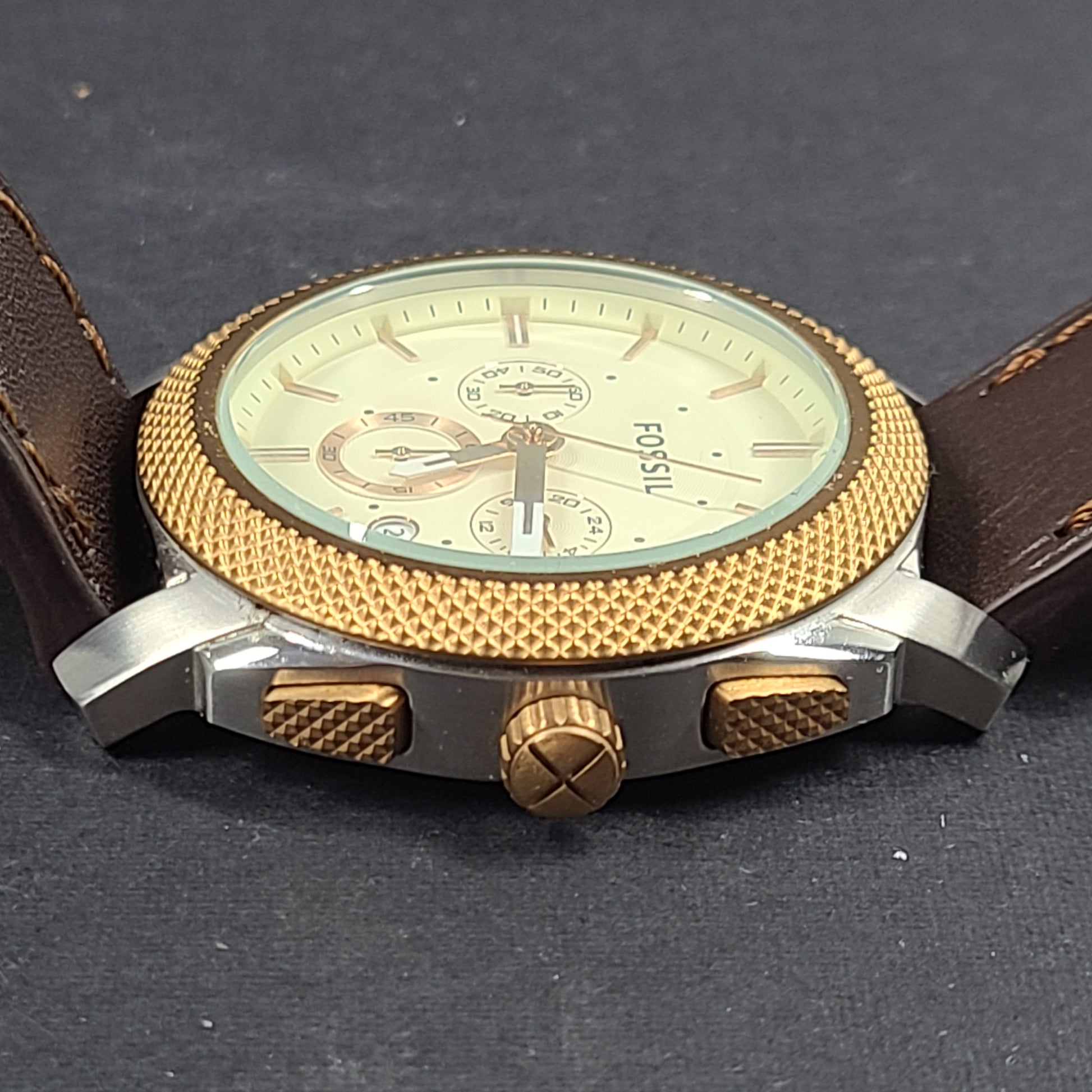 Fossil FS5040 Machine two-tone chronograph with brown leather strap and stainless steel case.