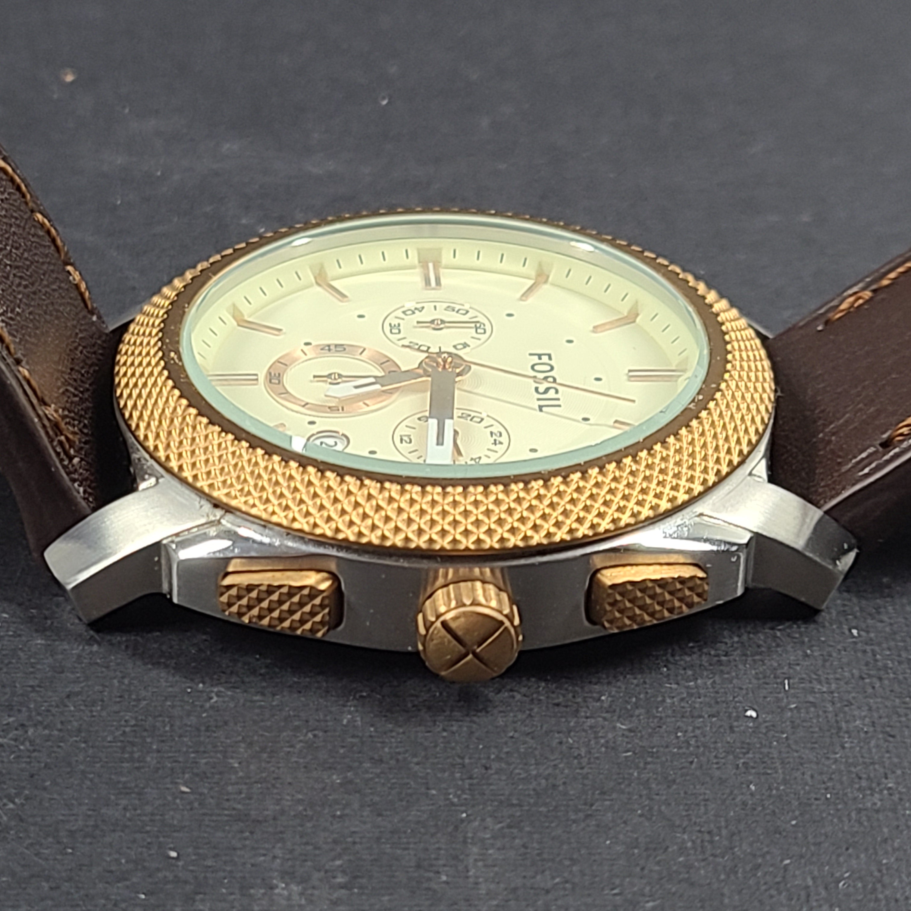 Fossil FS5040 Machine two-tone chronograph with brown leather strap and stainless steel case.