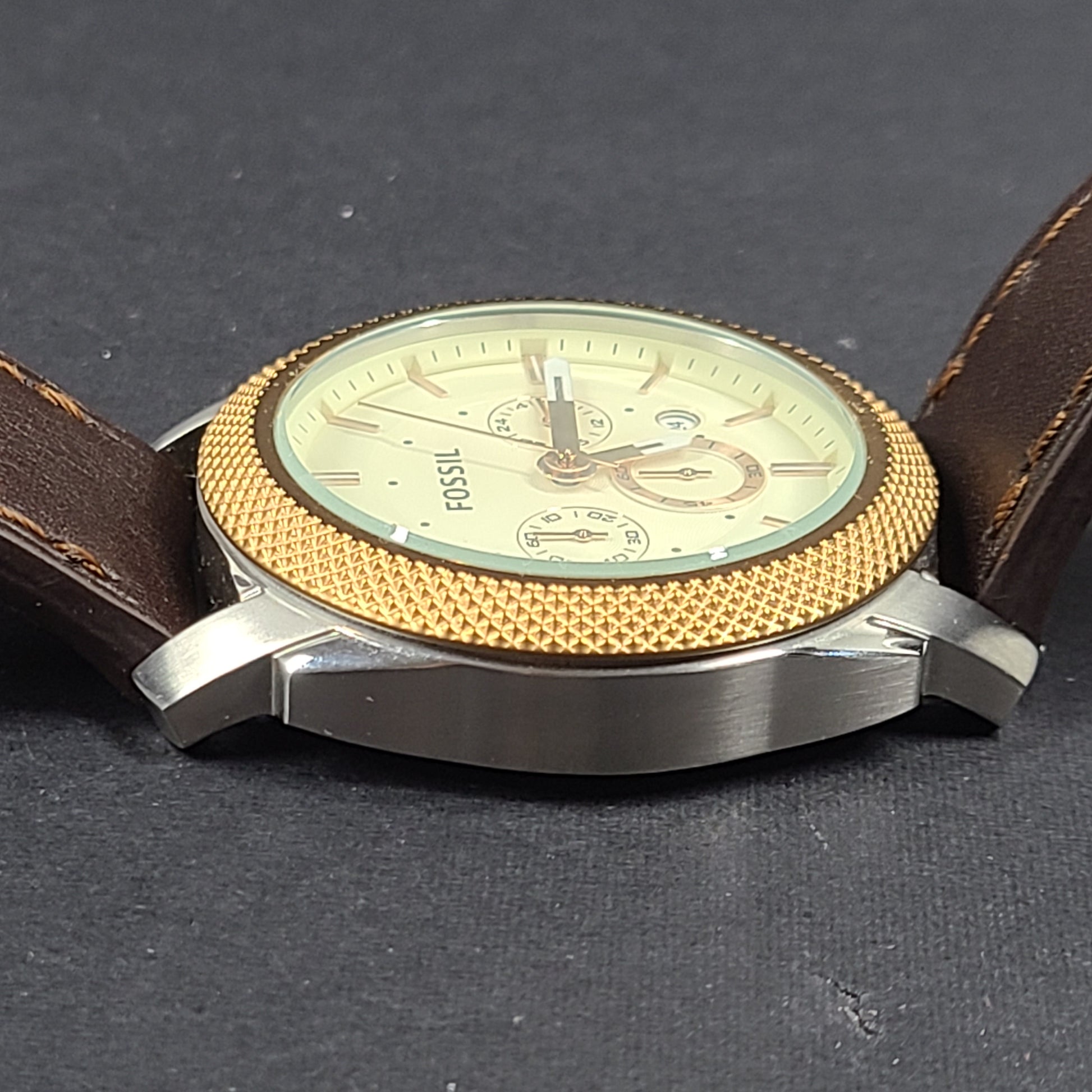 Fossil FS5040 Machine two-tone chronograph with brown leather strap and stainless steel case.