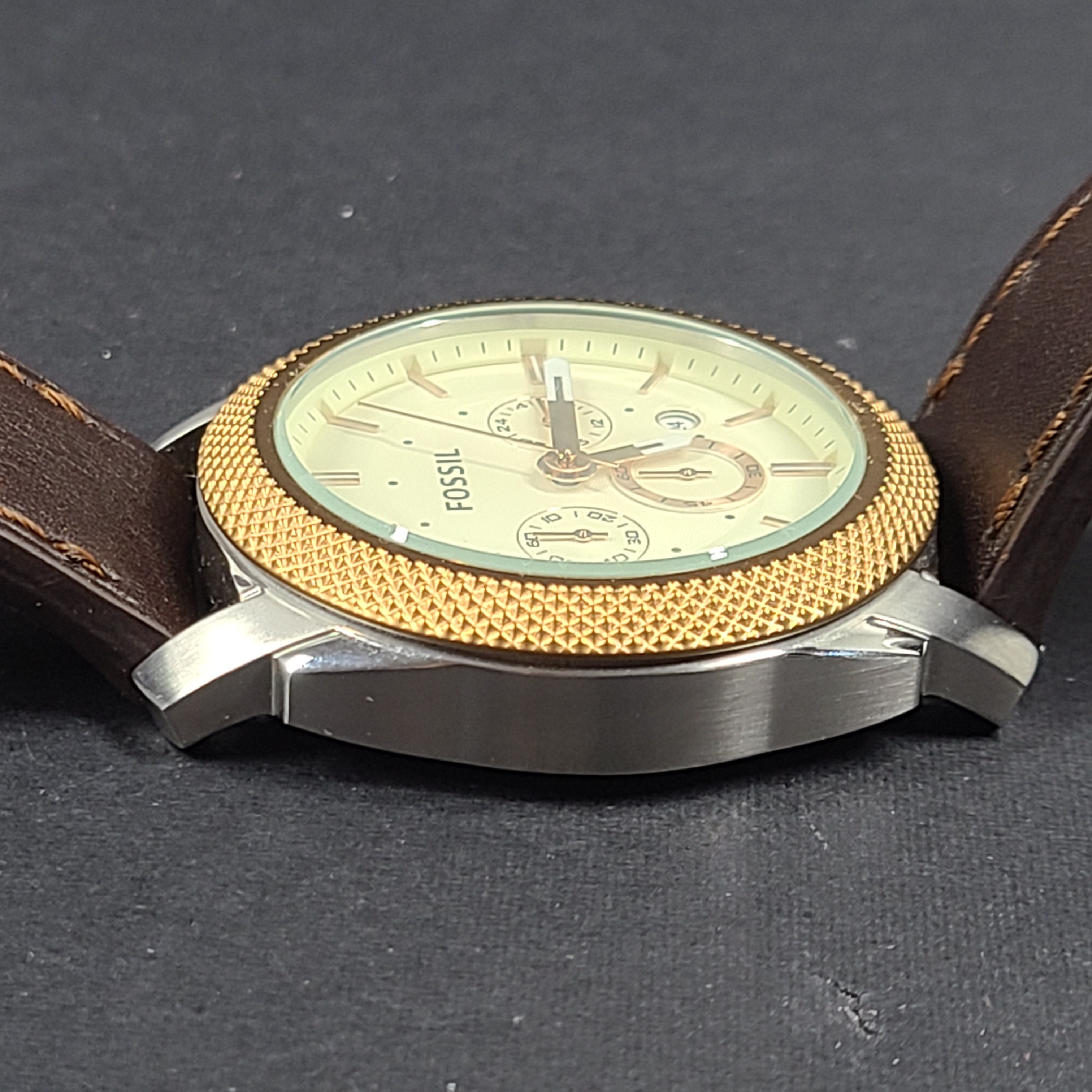 Fossil FS5040 Machine two-tone chronograph with brown leather strap and stainless steel case.