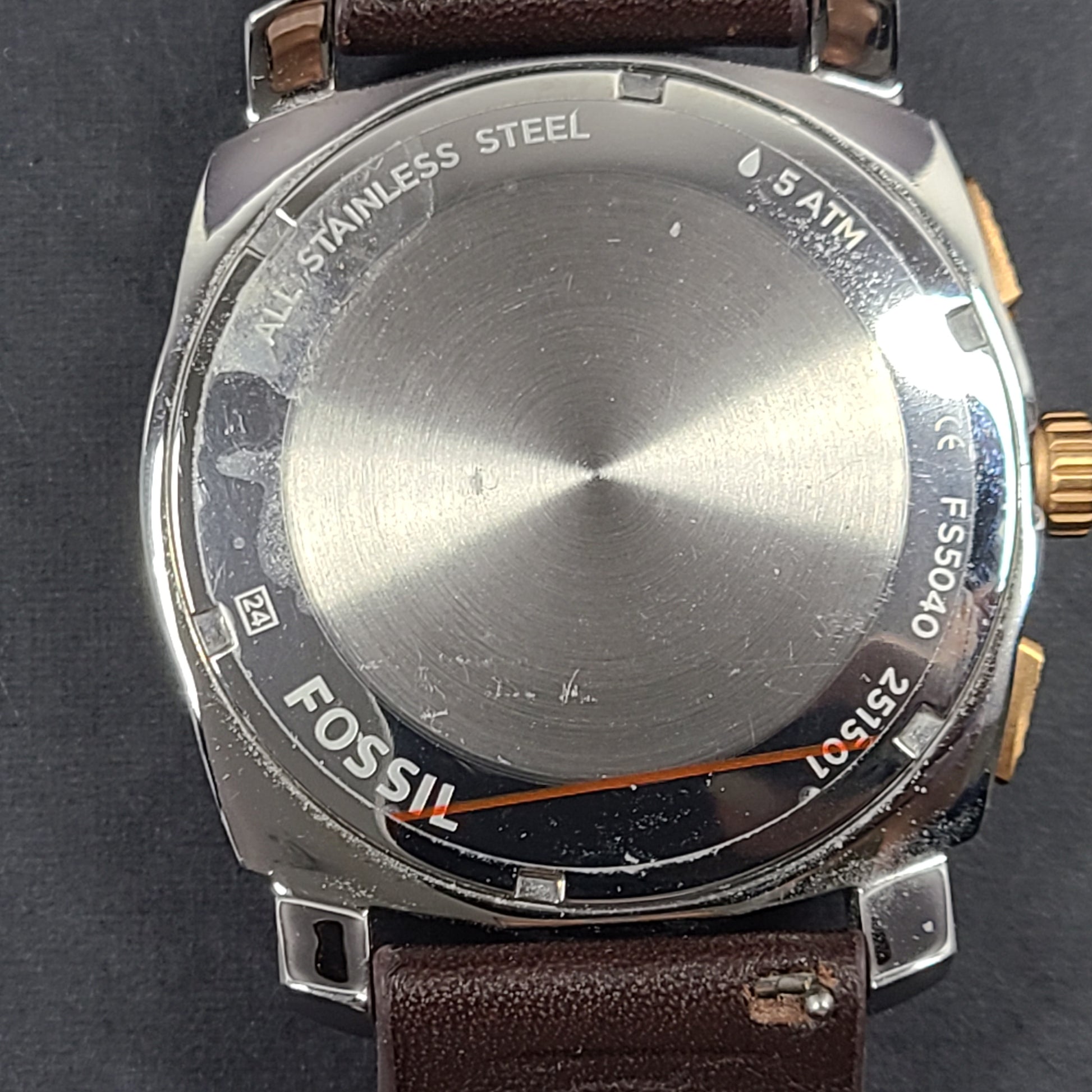 Fossil FS5040 Machine two-tone chronograph with brown leather strap and stainless steel case.