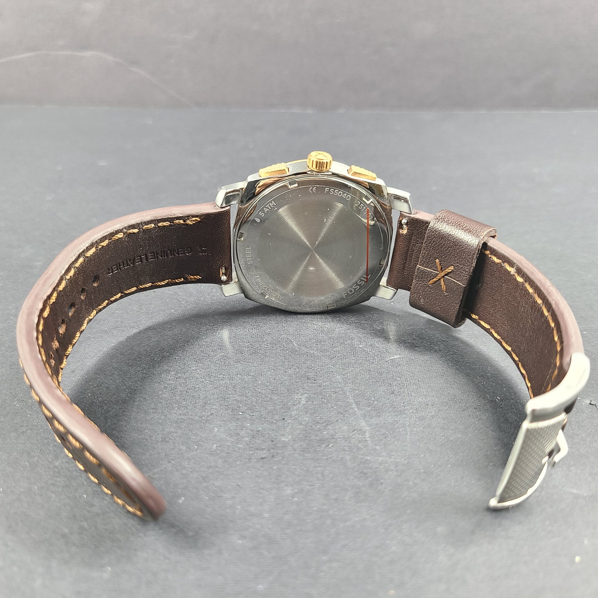 Fossil FS5040 Machine two-tone chronograph with brown leather strap and stainless steel case.