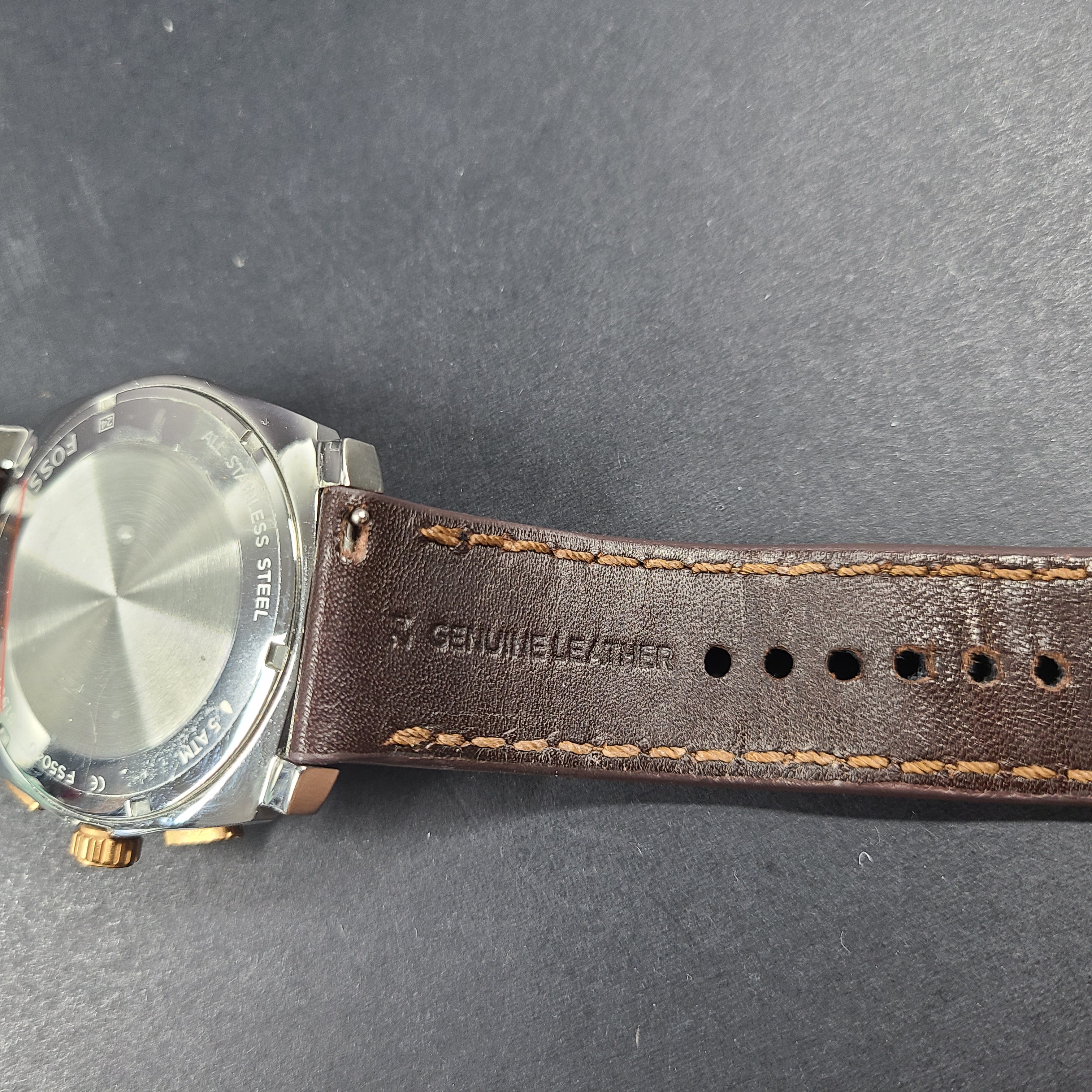 Fossil FS5040 Machine two-tone chronograph with brown leather strap and stainless steel case.