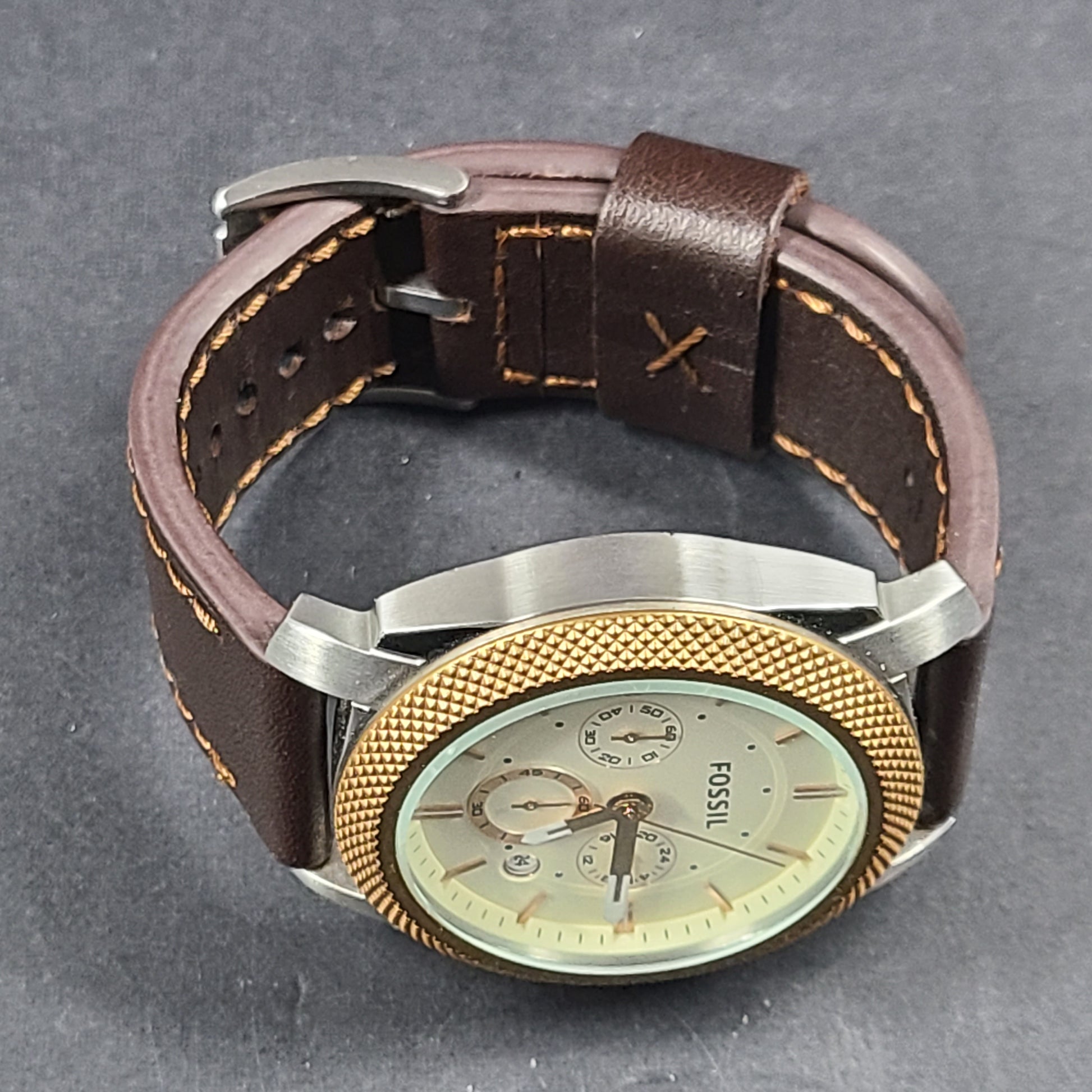Fossil FS5040 Machine two-tone chronograph with brown leather strap and stainless steel case.