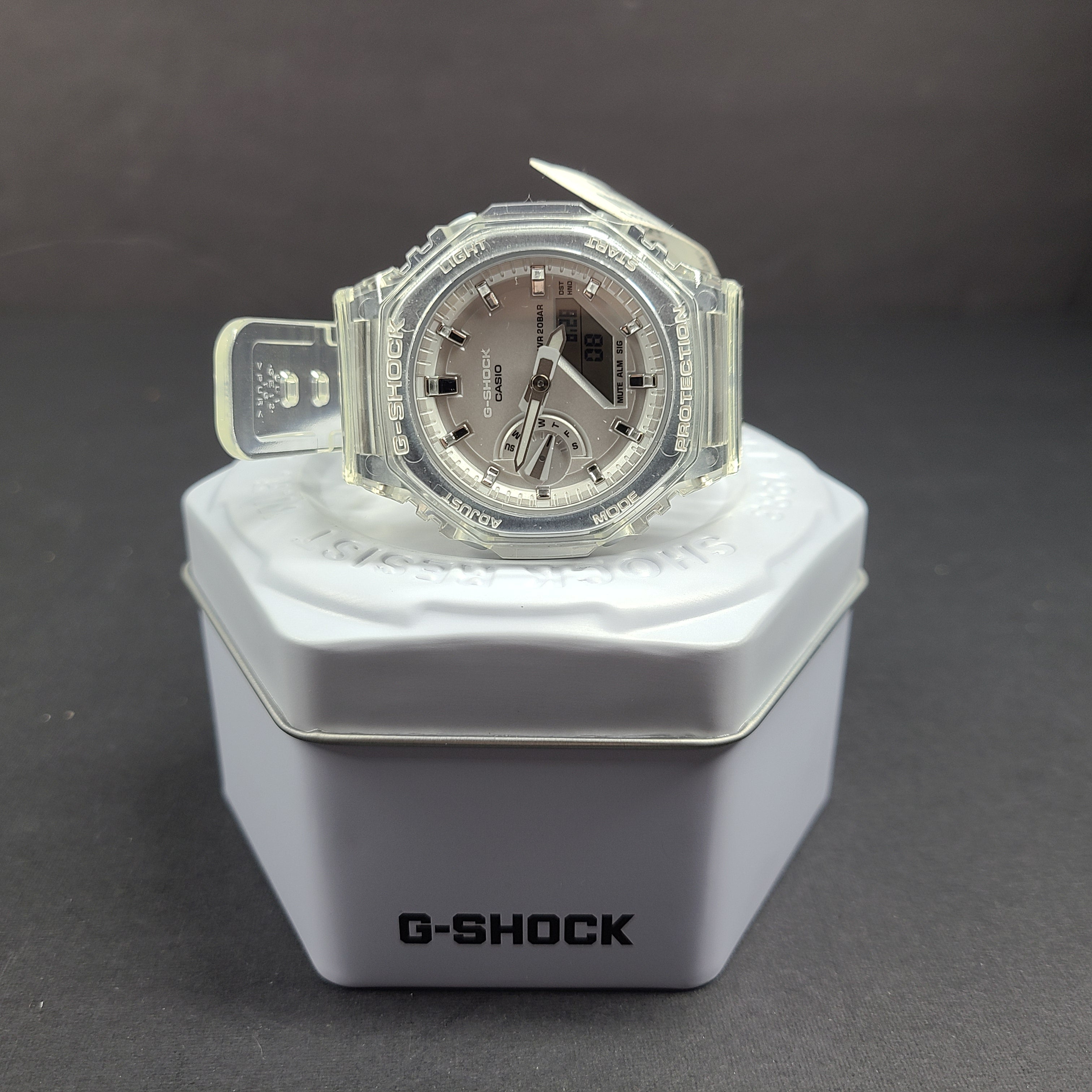 Casio G-Shock GA-2100SK features an octagonal bezel, carbon core guard case, and transparent silver finish.