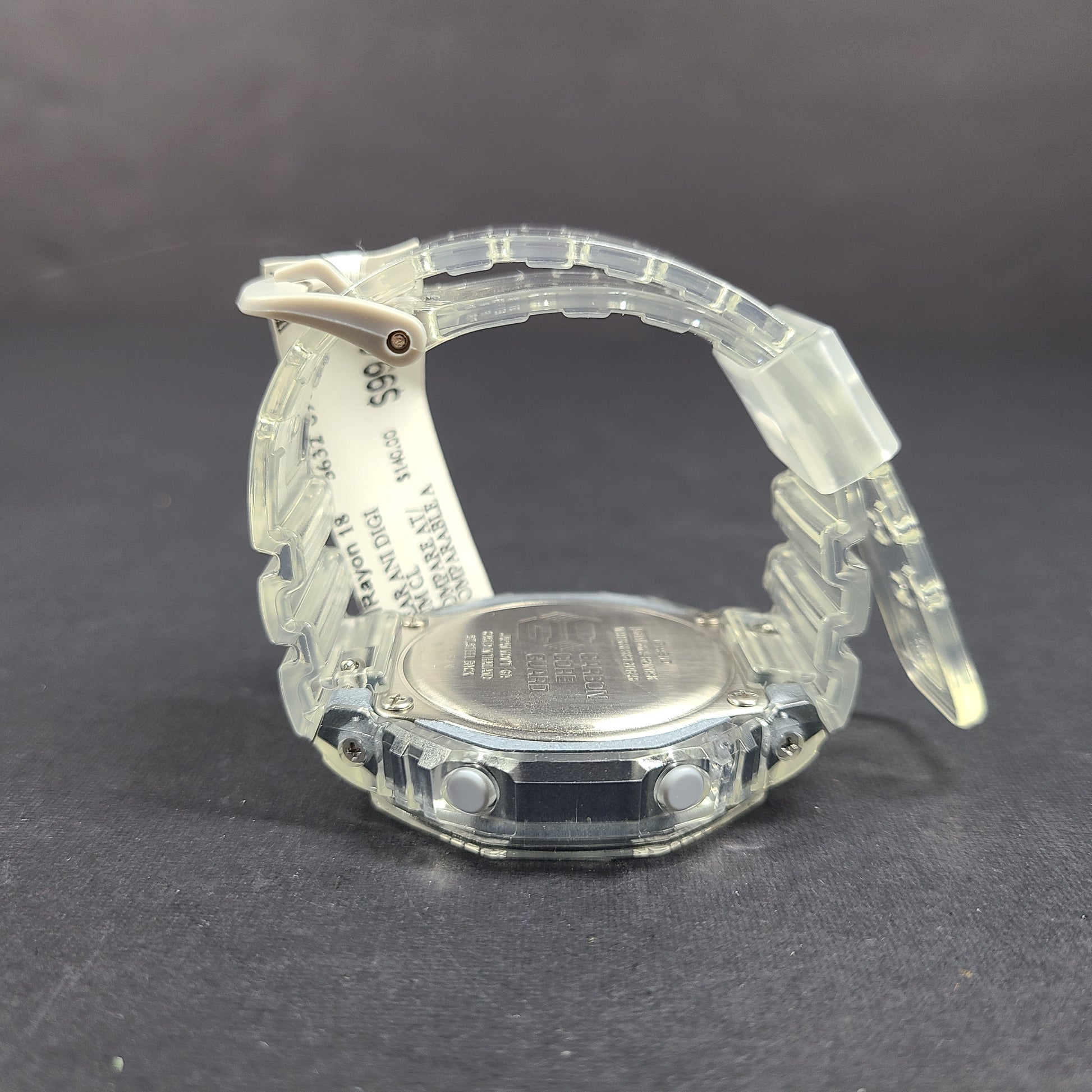 Casio G-Shock GA-2100SK features an octagonal bezel, carbon core guard case, and transparent silver finish.