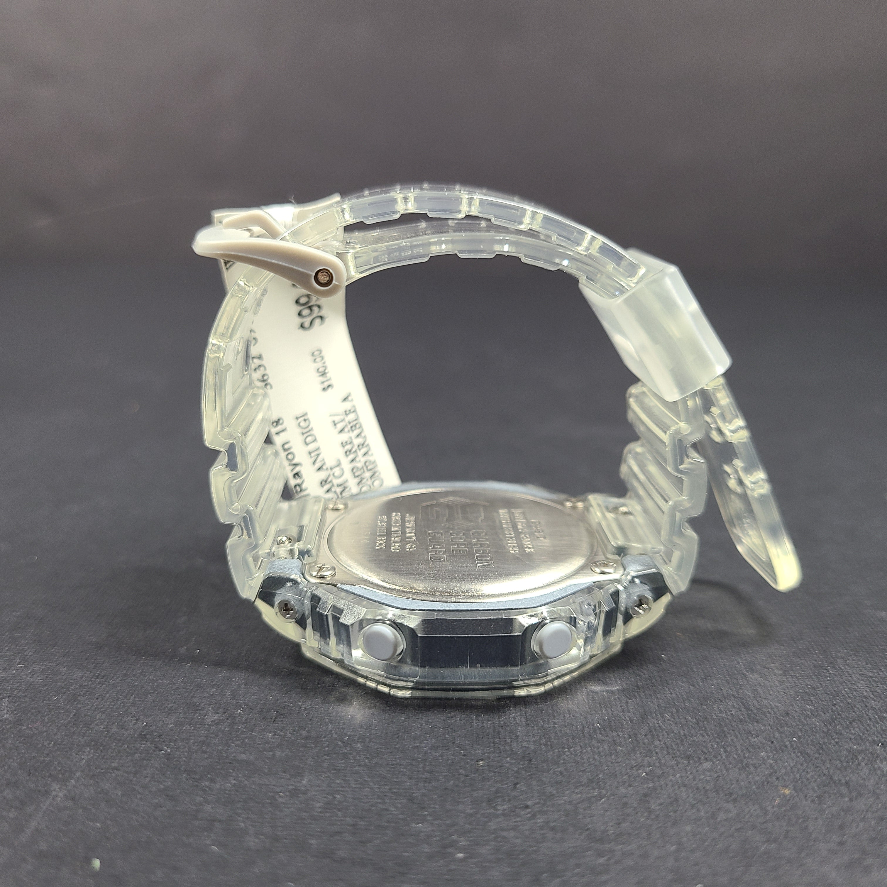 Casio G-Shock GA-2100SK features an octagonal bezel, carbon core guard case, and transparent silver finish.