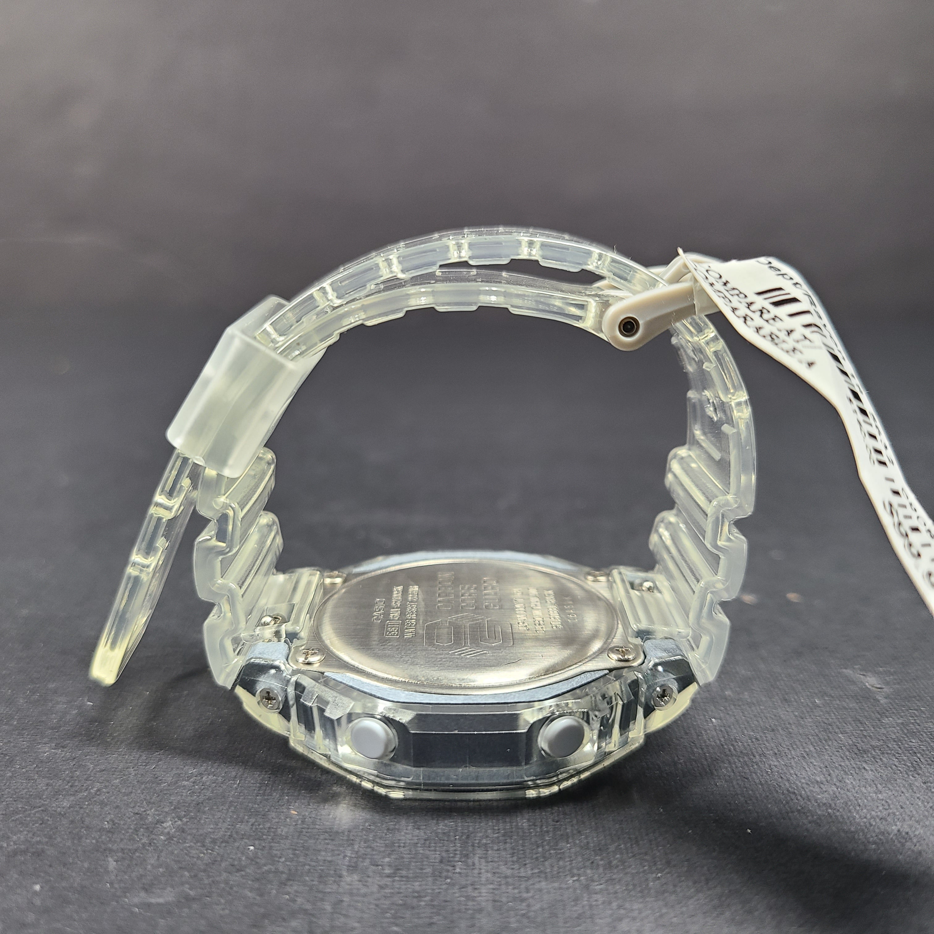 Casio G-Shock GA-2100SK features an octagonal bezel, carbon core guard case, and transparent silver finish.