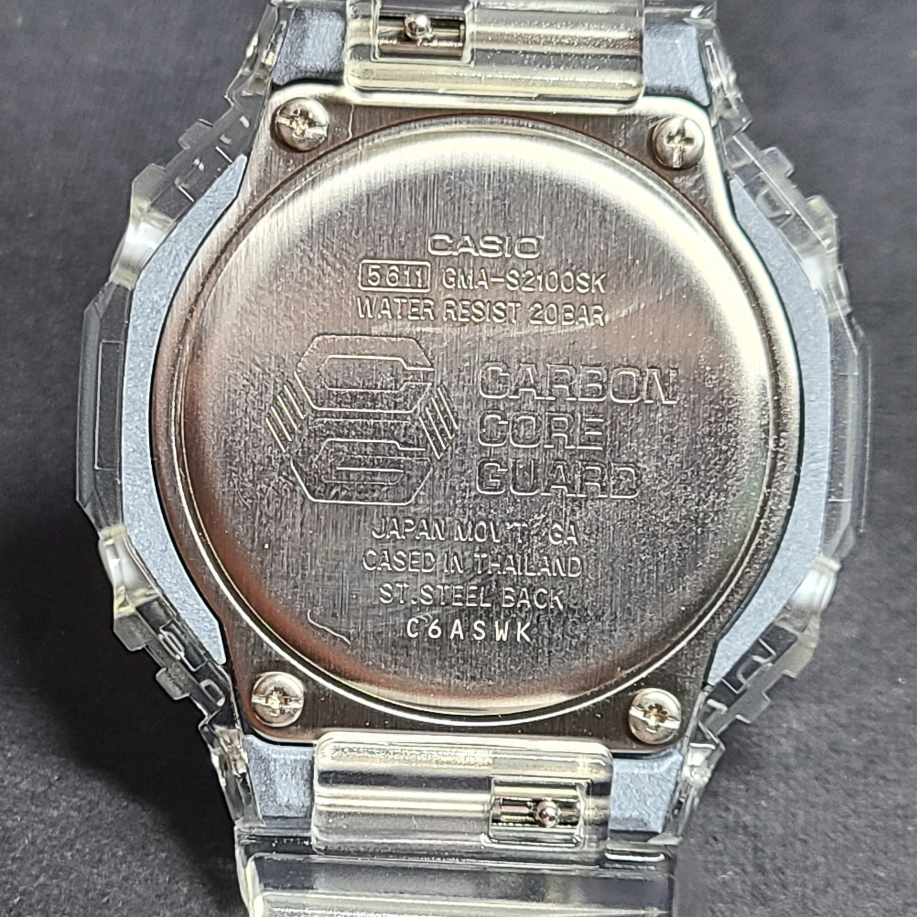 Casio G-Shock GA-2100SK features an octagonal bezel, carbon core guard case, and transparent silver finish.