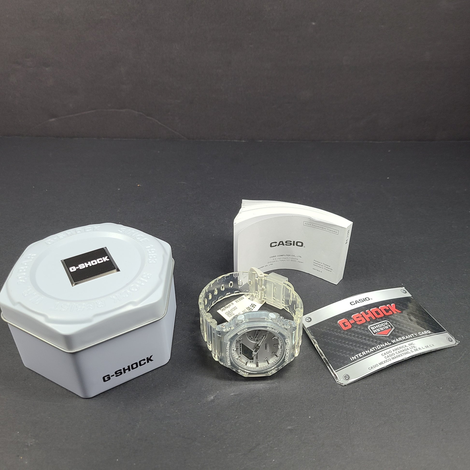 Casio G-Shock GA-2100SK features an octagonal bezel, carbon core guard case, and transparent silver finish.