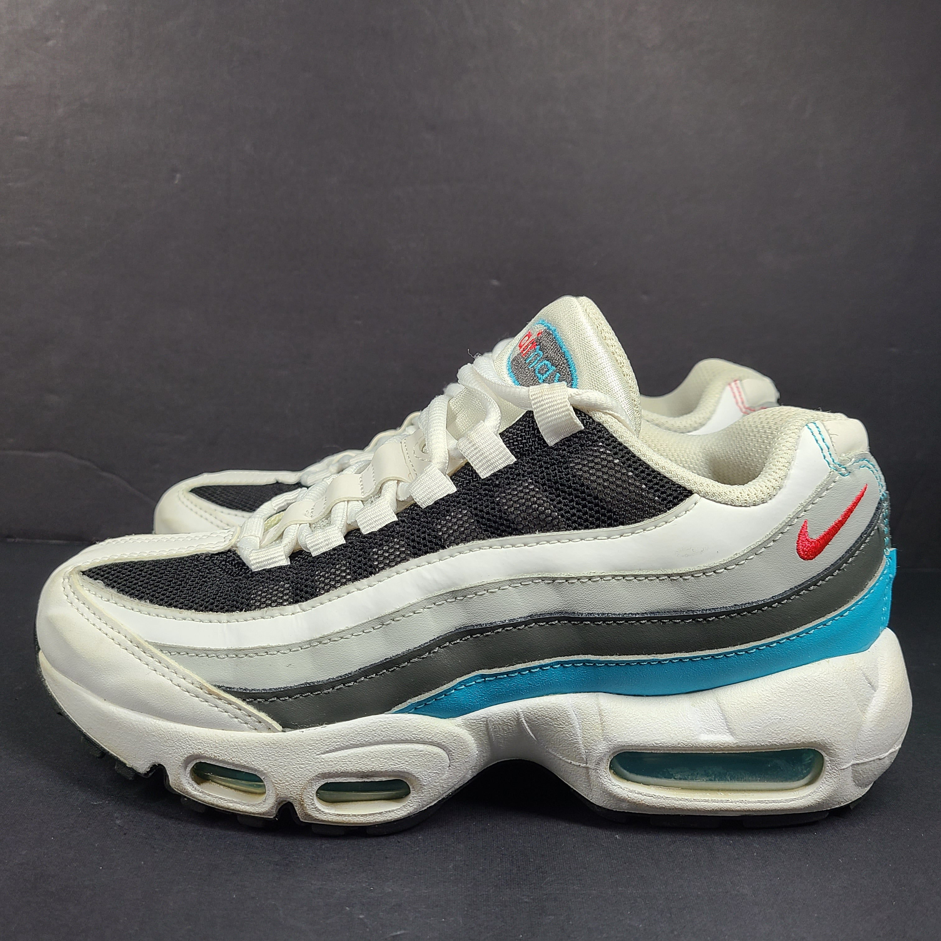 Nike Air Max 95 Recraft in white, black and teal with red accents, youth size US 4.5Y.