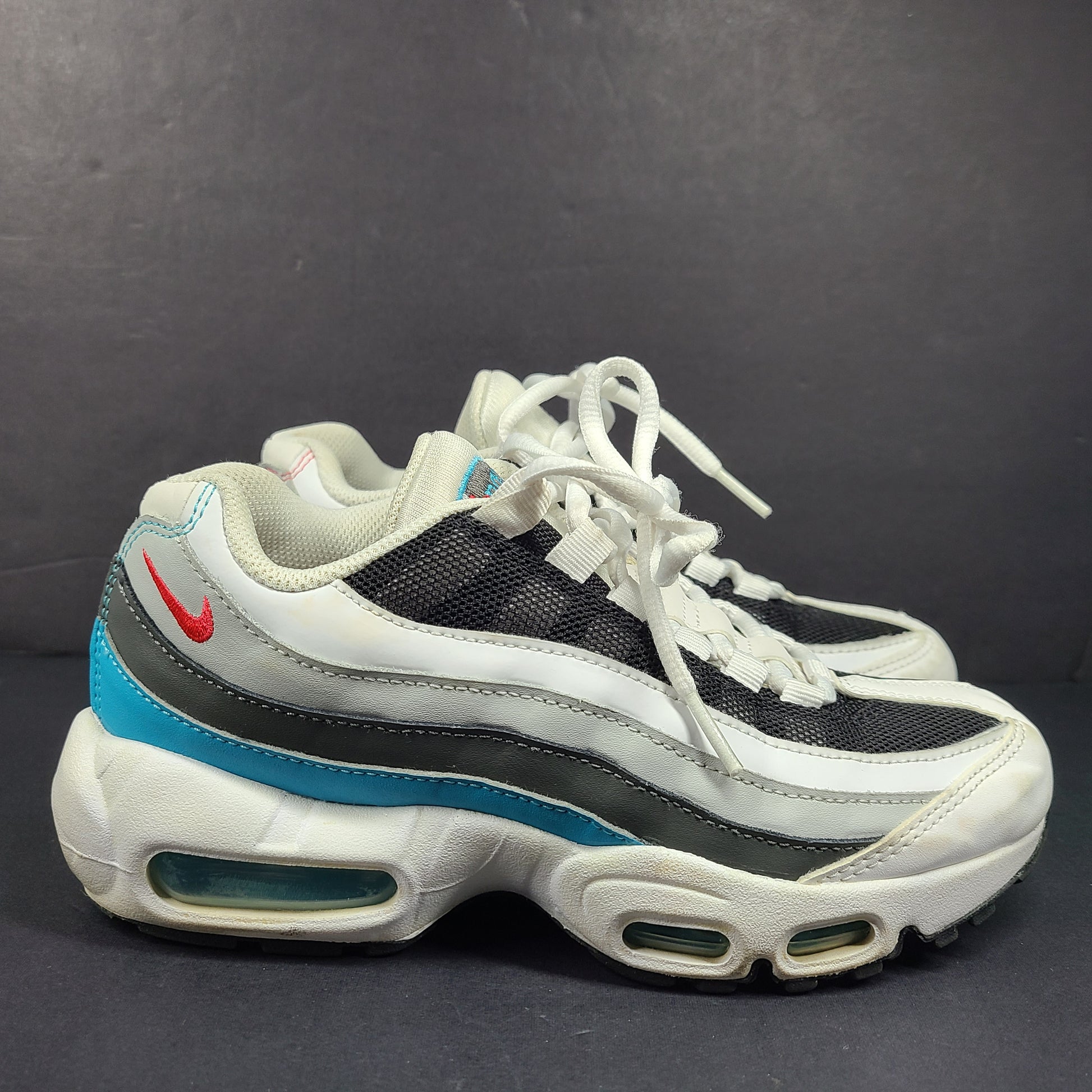 Nike Air Max 95 Recraft in white, black and teal with red accents, youth size US 4.5Y.