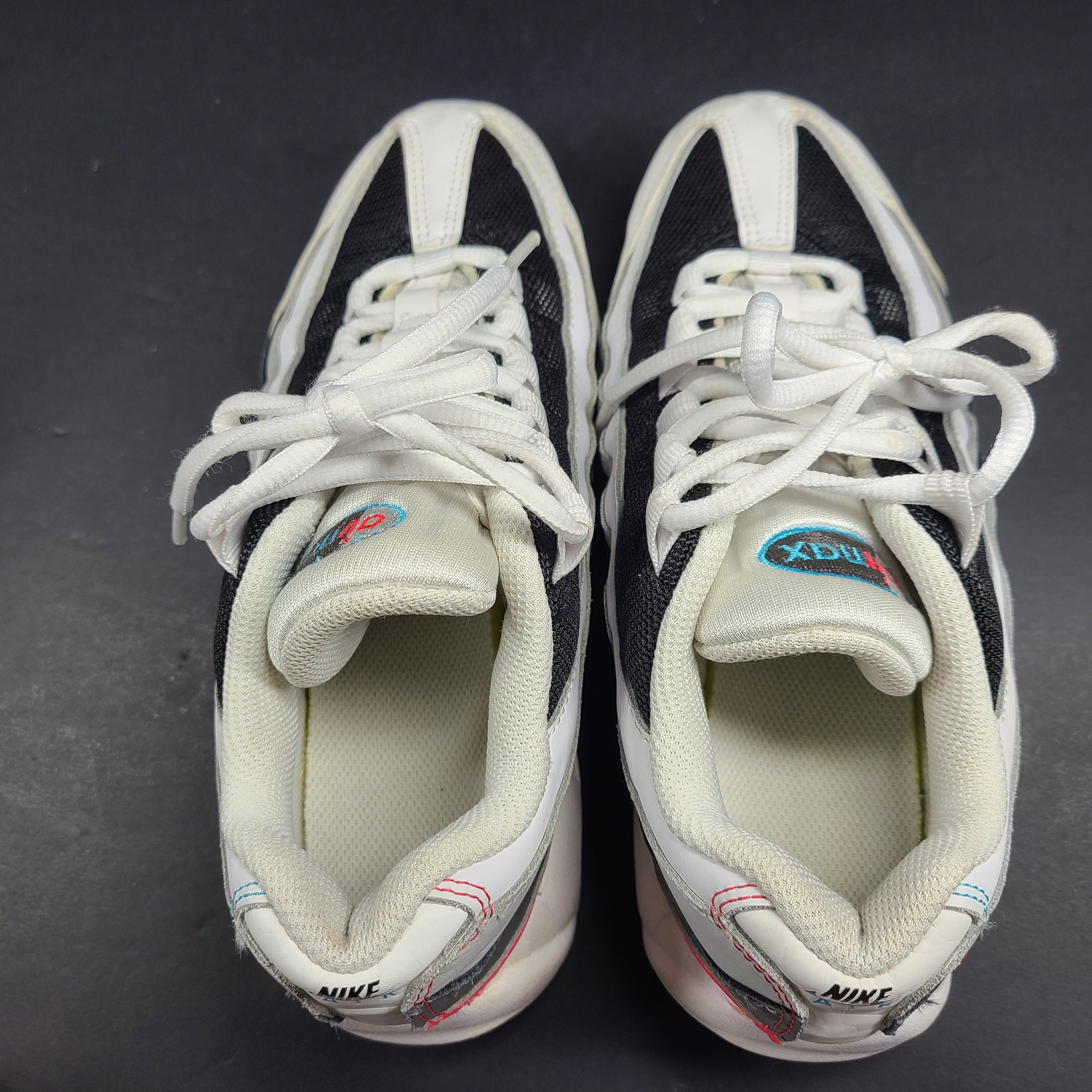 Nike Air Max 95 Recraft in white, black and teal with red accents, youth size US 4.5Y.