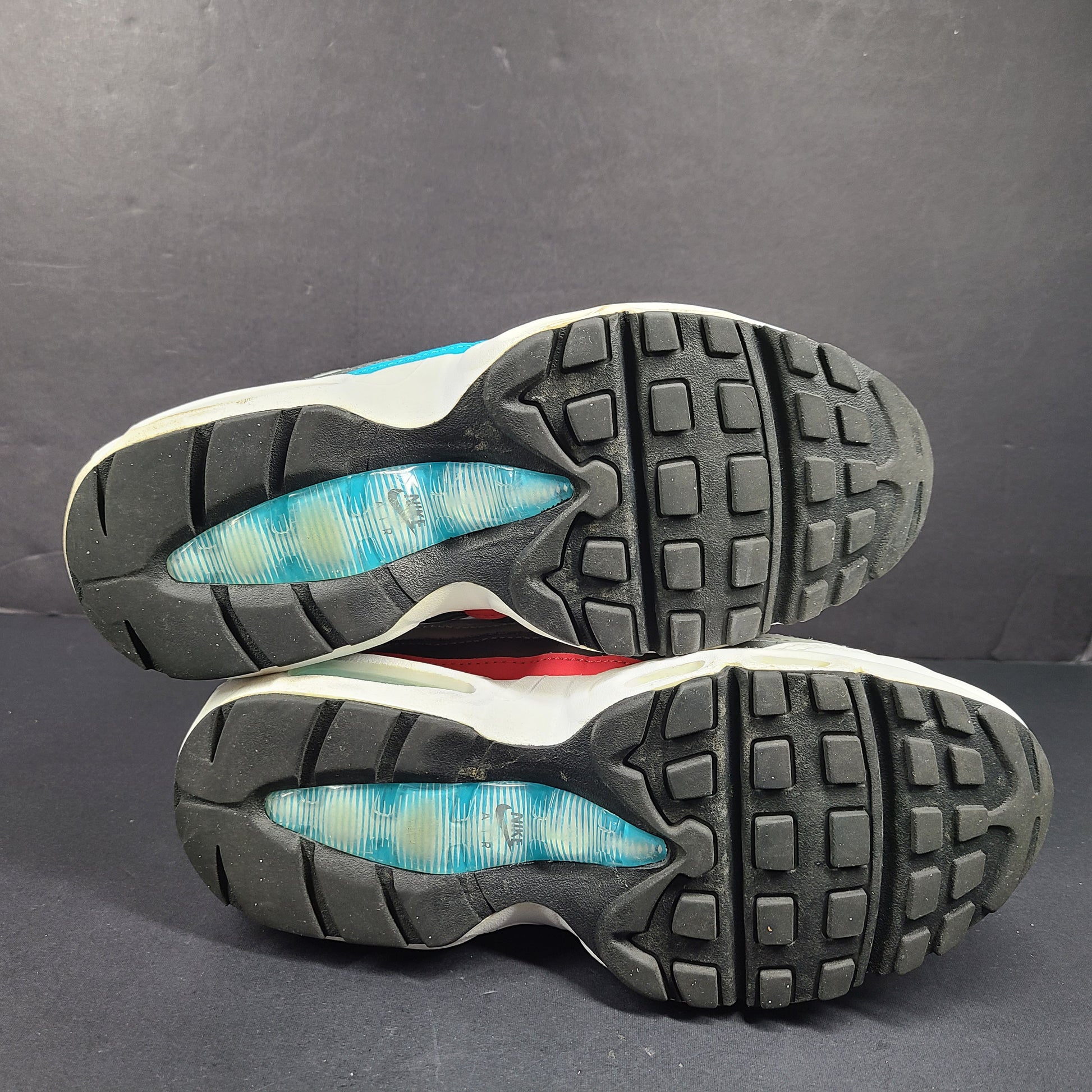 Nike Air Max 95 Recraft in white, black and teal with red accents, youth size US 4.5Y.