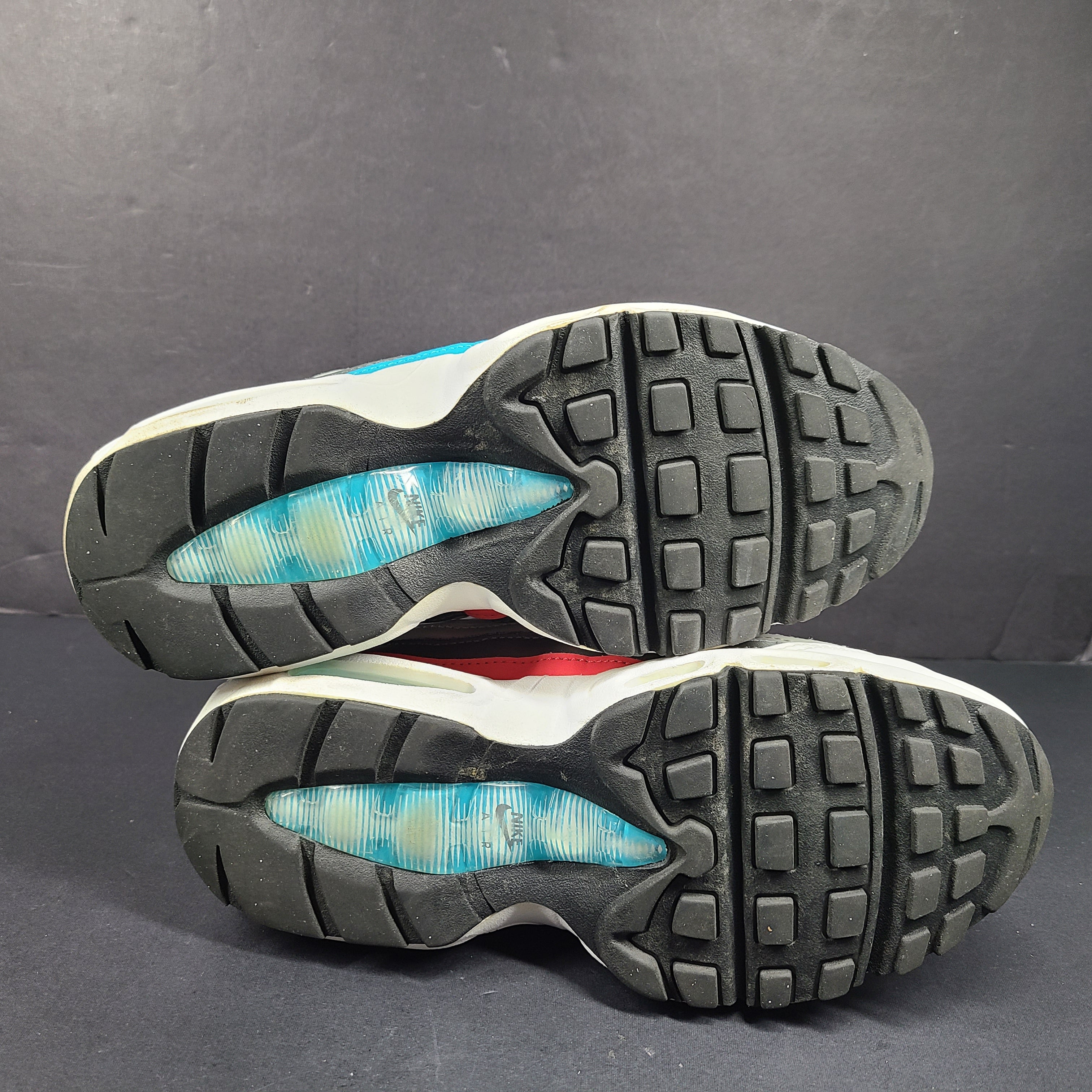 Nike Air Max 95 Recraft in white, black and teal with red accents, youth size US 4.5Y.