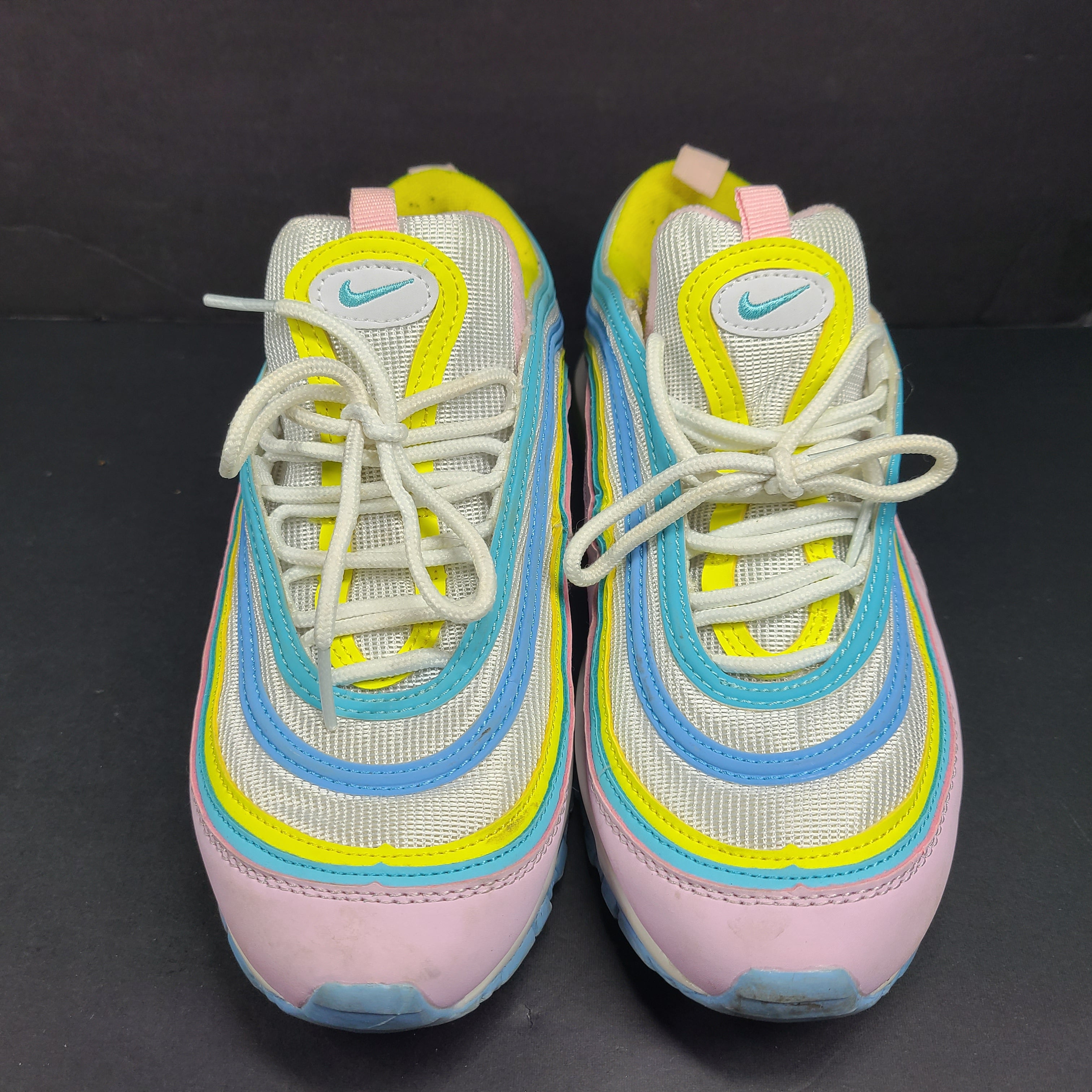 Nike Air Max 97 Multicolor in pastel pink, blue, yellow and white with signature full-length Air Max cushioning for comfortable wear.