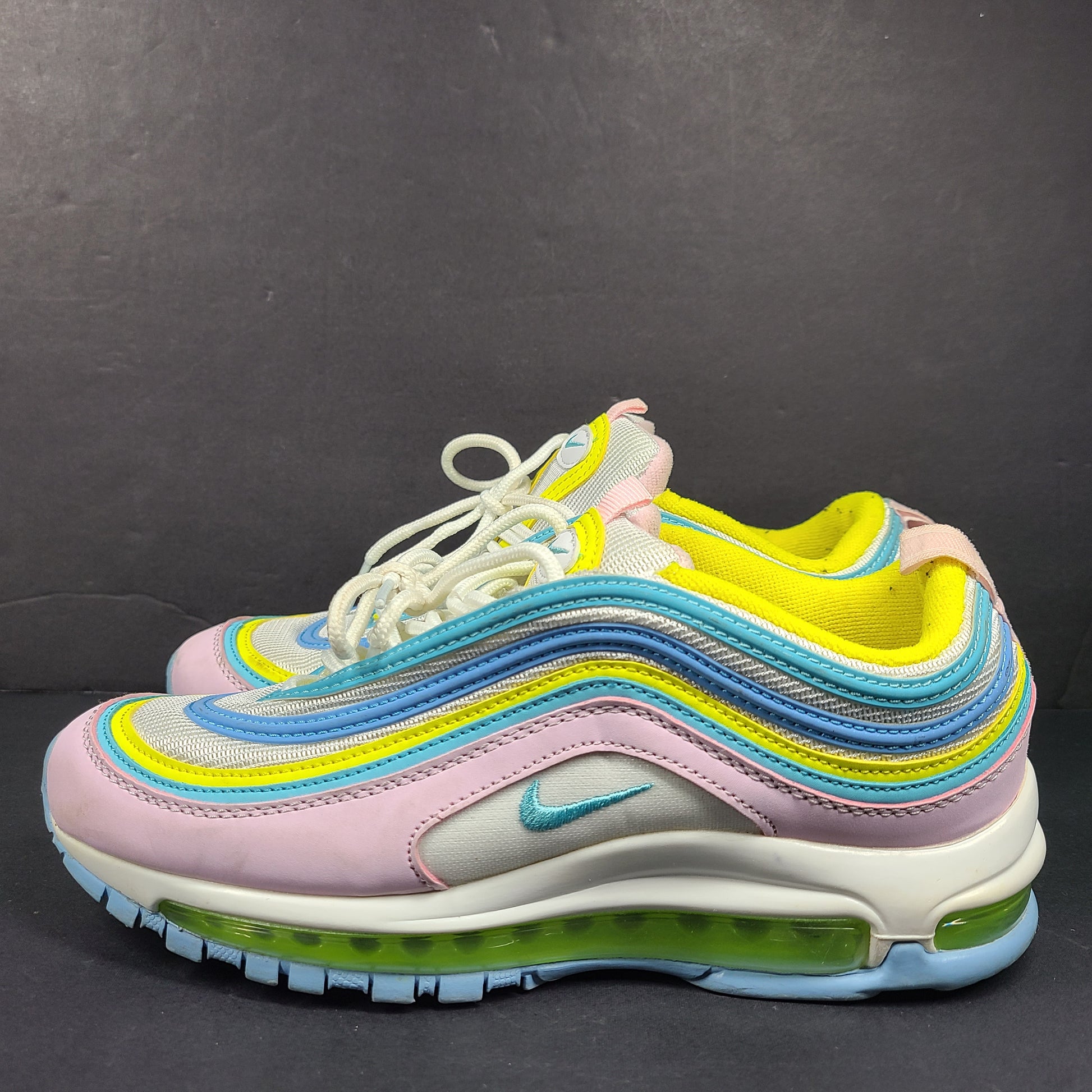 Nike Air Max 97 Multicolor in pastel pink, blue, yellow and white with signature full-length Air Max cushioning for comfortable wear.
