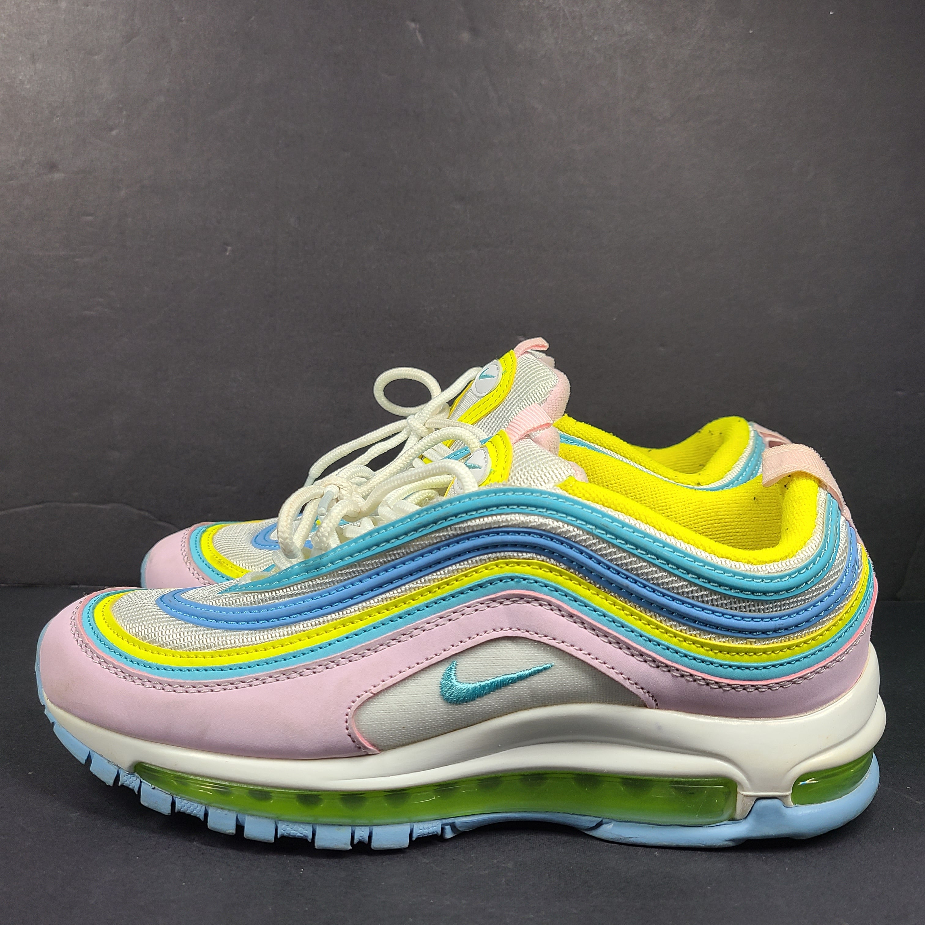 Nike Air Max 97 Multicolor in pastel pink, blue, yellow and white with signature full-length Air Max cushioning for comfortable wear.