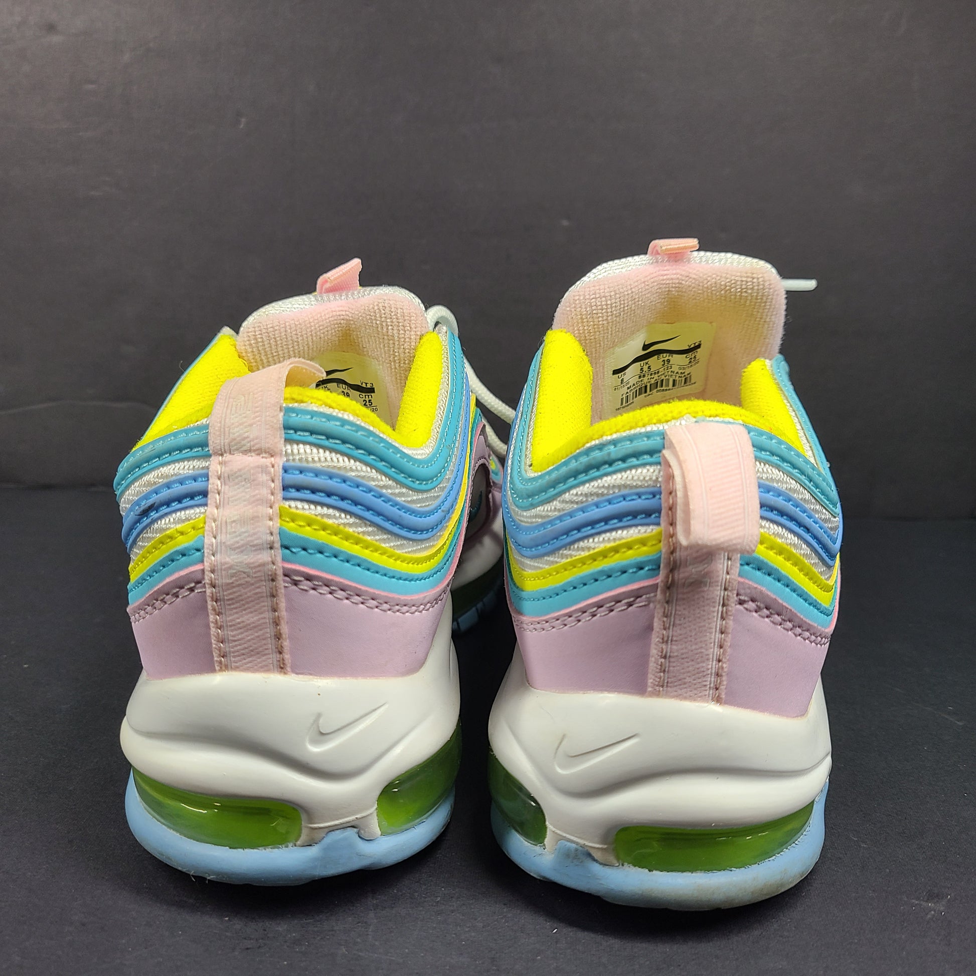 Nike Air Max 97 Multicolor in pastel pink, blue, yellow and white with signature full-length Air Max cushioning for comfortable wear.