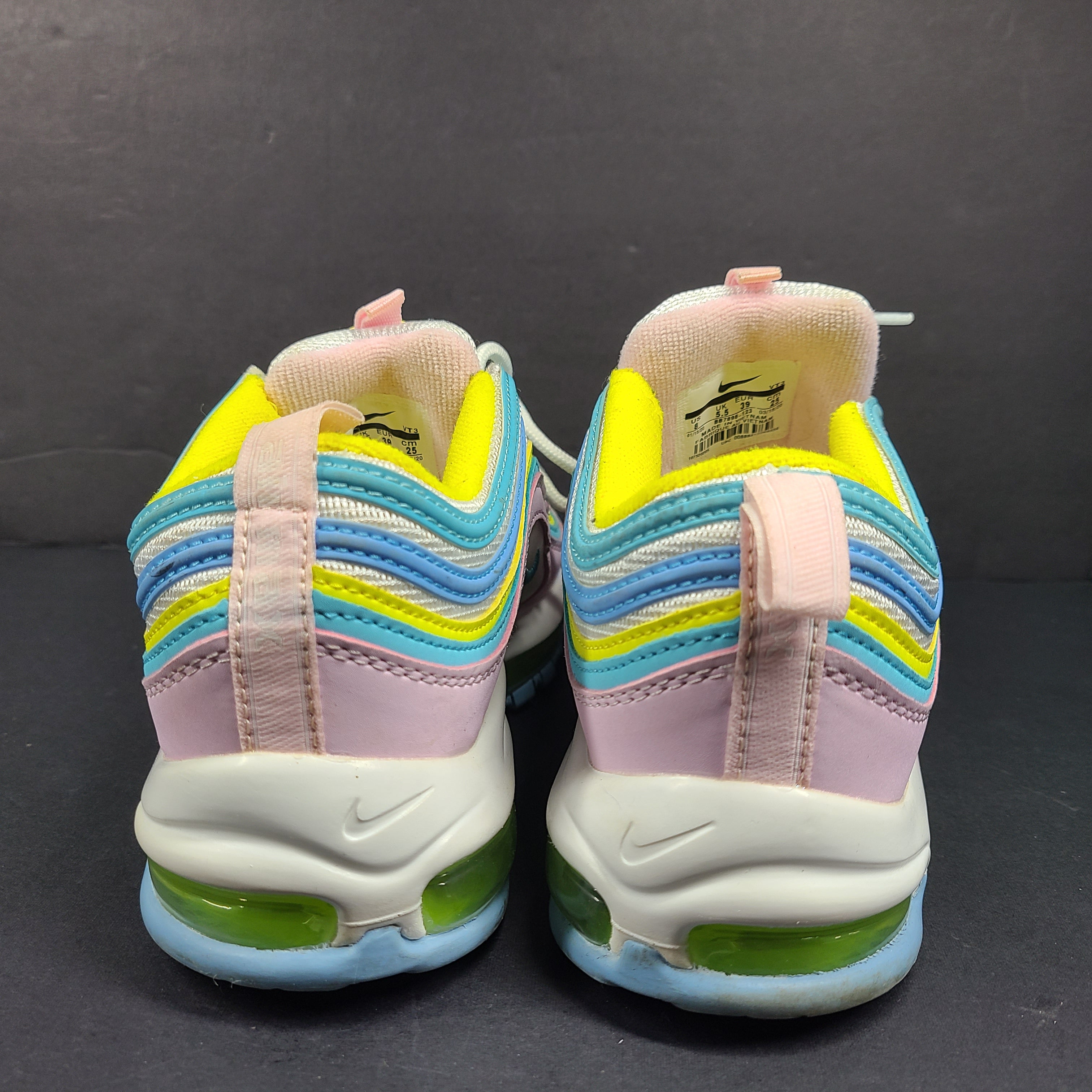 Nike Air Max 97 Multicolor in pastel pink, blue, yellow and white with signature full-length Air Max cushioning for comfortable wear.