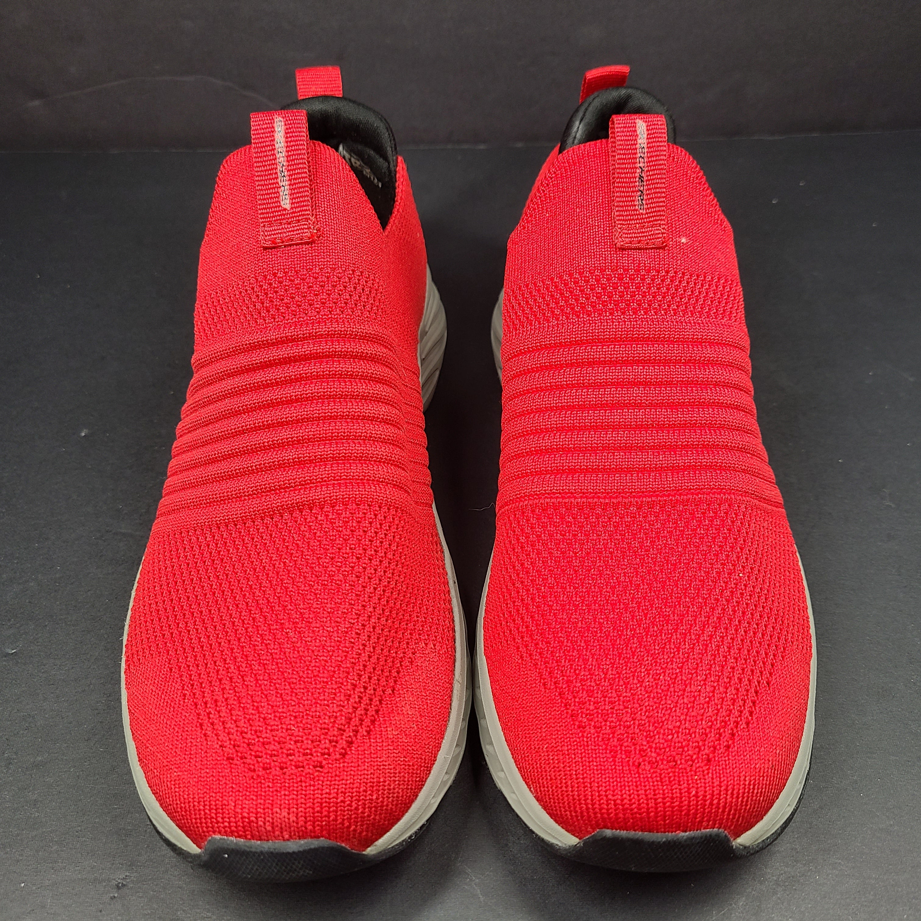 Red Skechers SKX Air-Cooled Memory Foam sneakers in US size 5.5 with cushioned support.