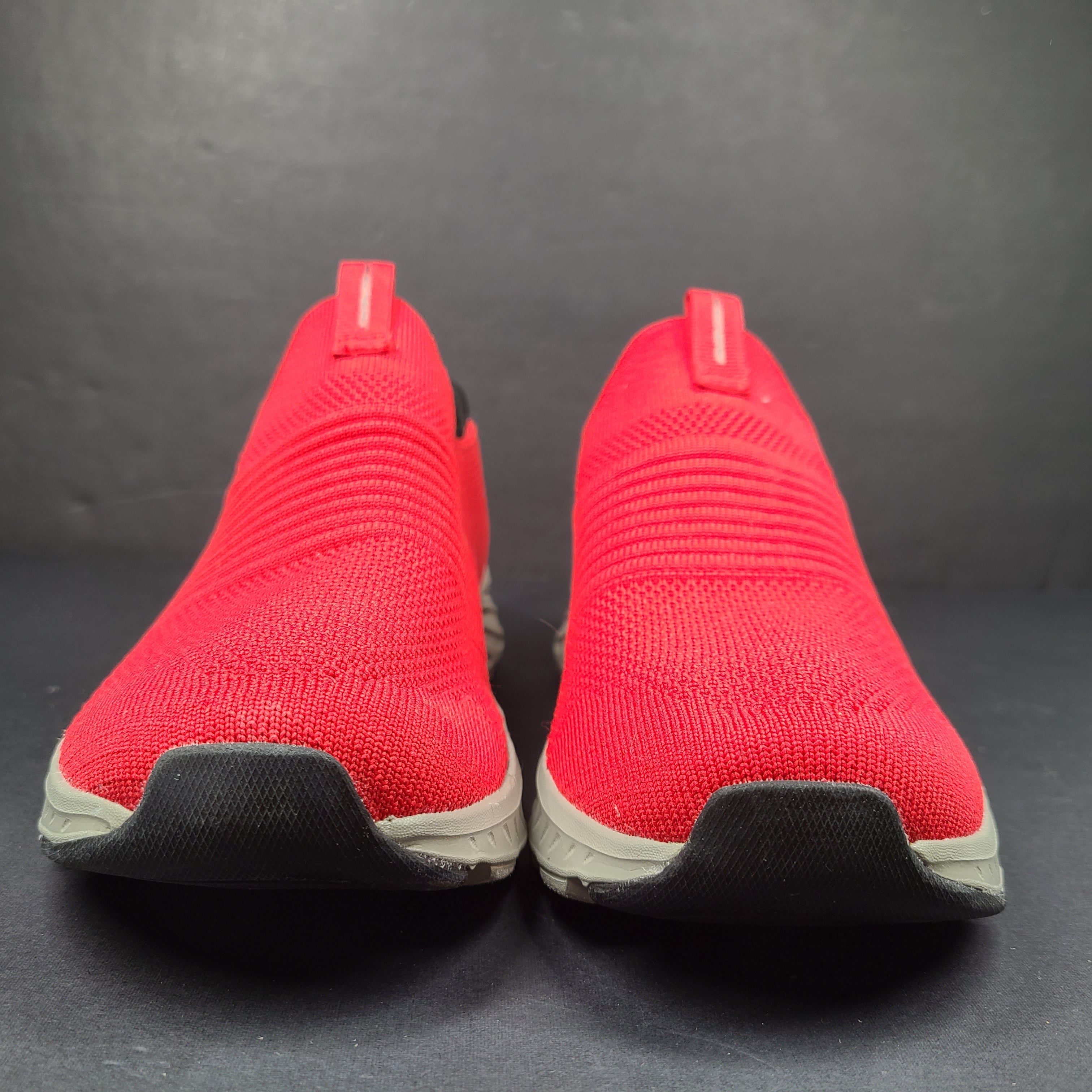 Red Skechers SKX Air-Cooled Memory Foam sneakers in US size 5.5 with cushioned support.
