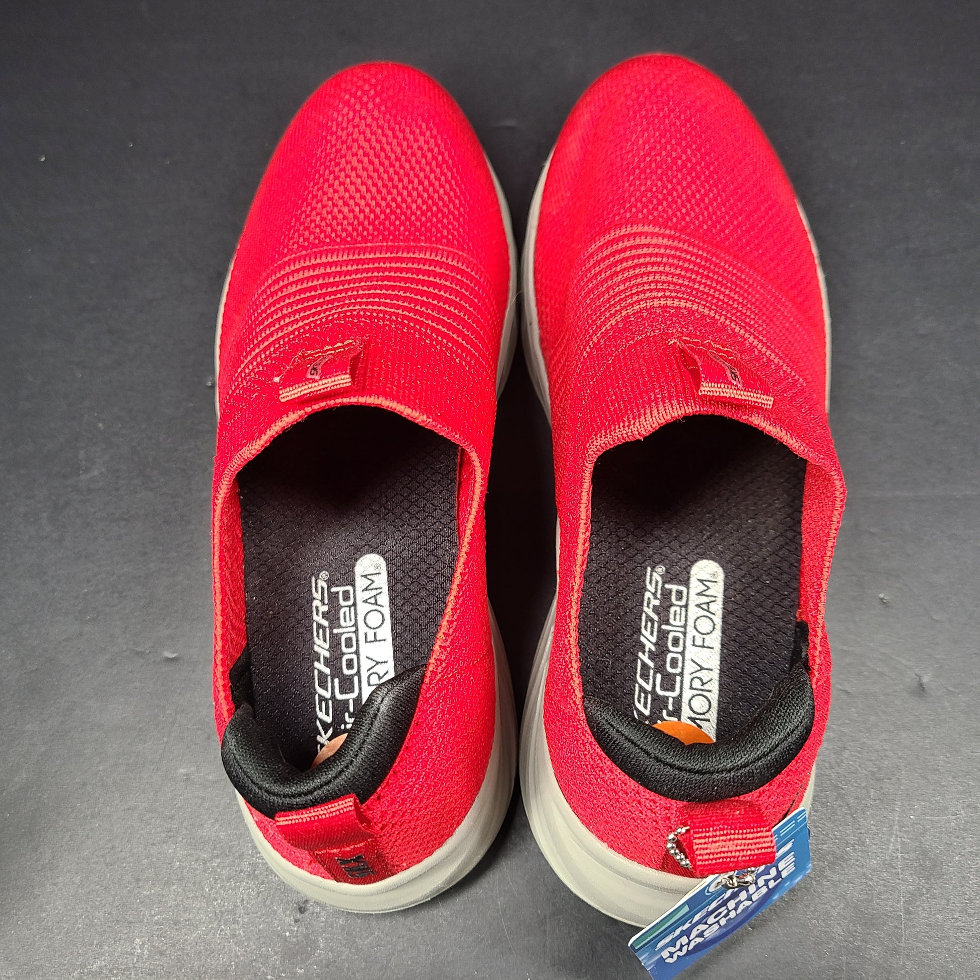 Red Skechers SKX Air-Cooled Memory Foam sneakers in US size 5.5 with cushioned support.