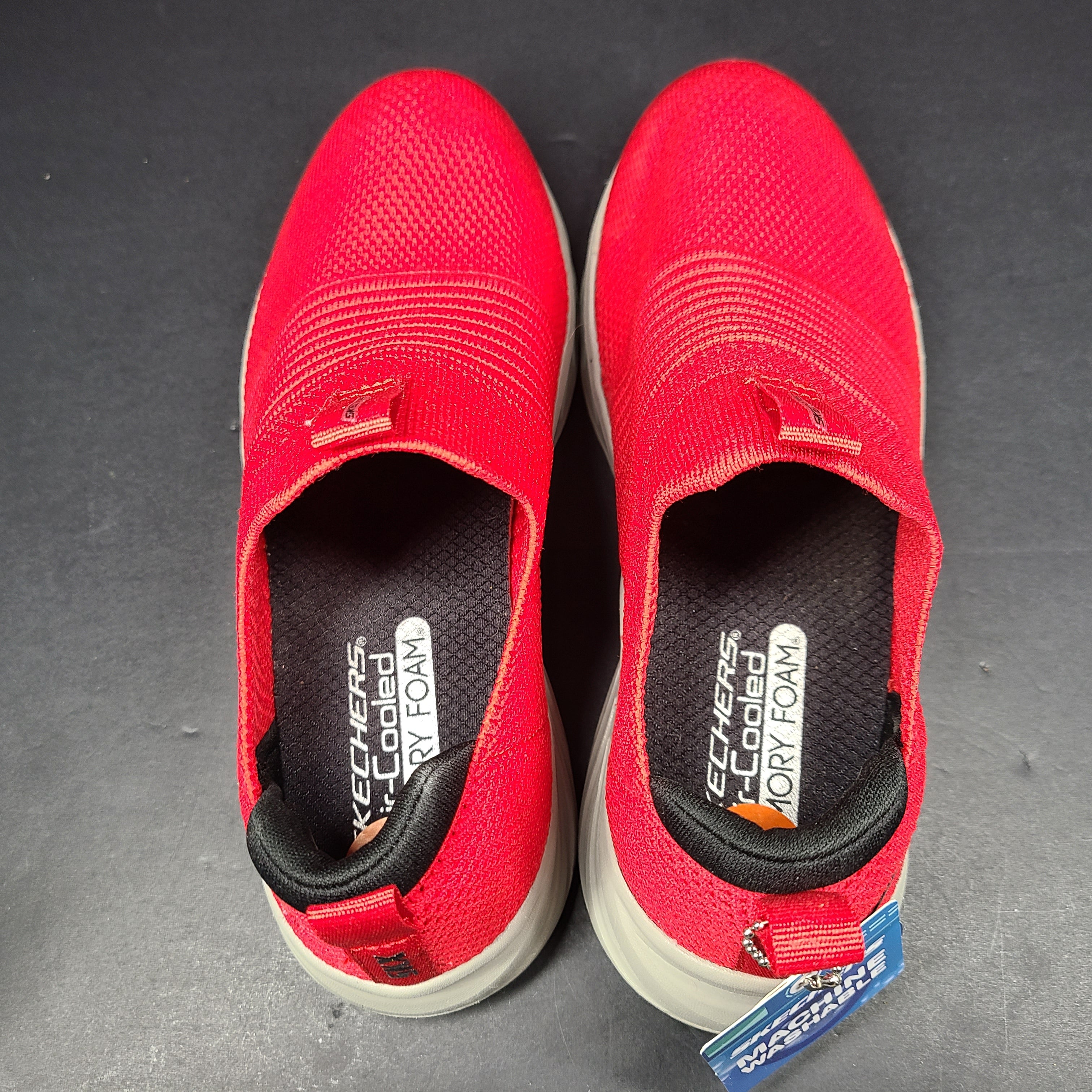 Red Skechers SKX Air-Cooled Memory Foam sneakers in US size 5.5 with cushioned support.