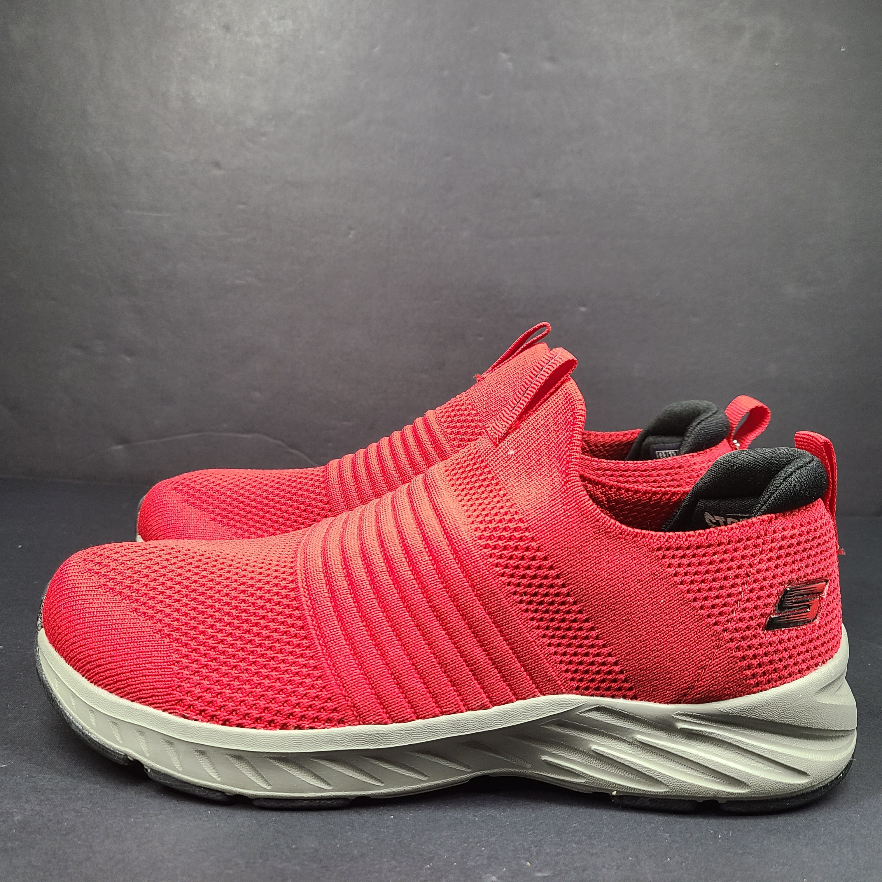 Red Skechers SKX Air-Cooled Memory Foam sneakers in US size 5.5 with cushioned support.