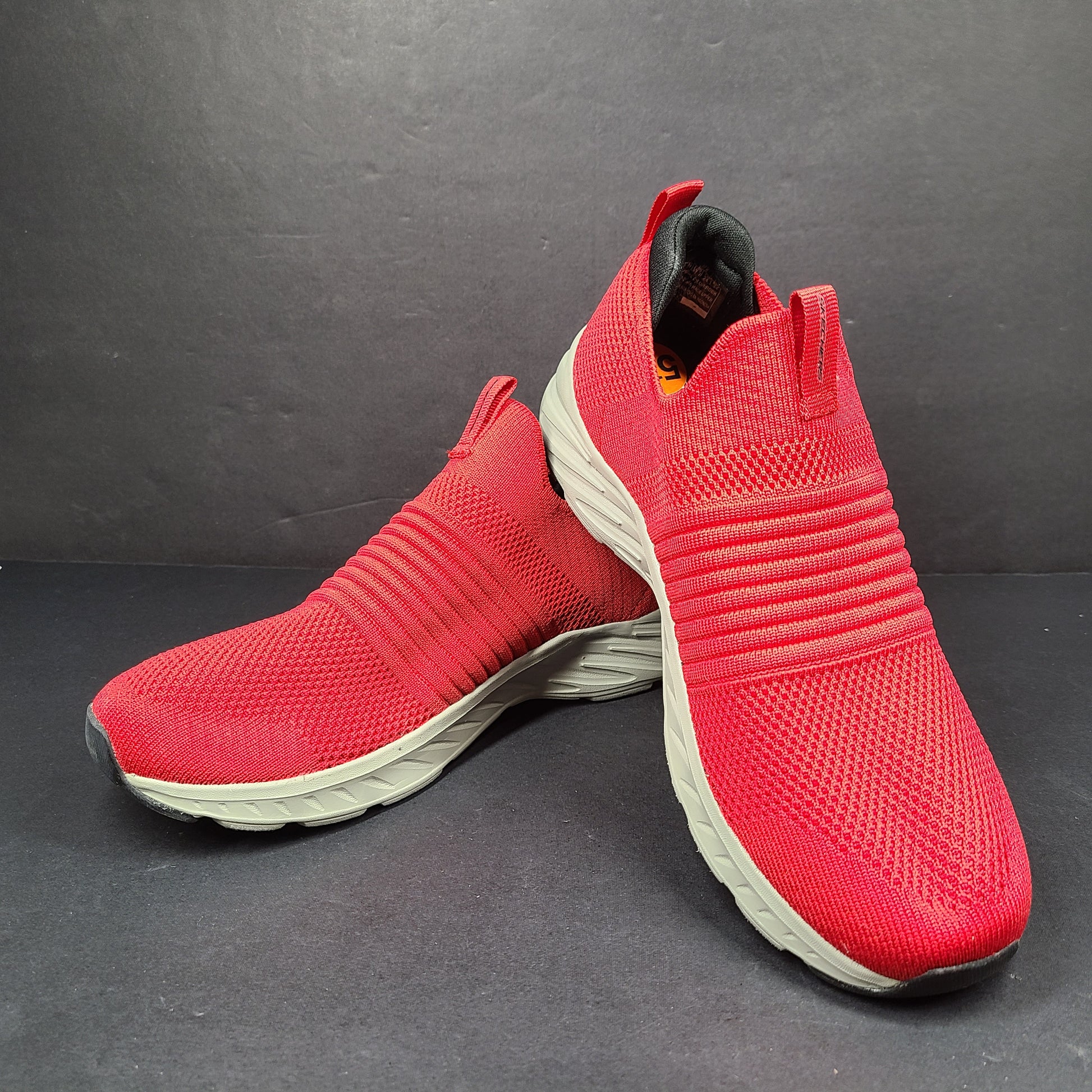 Red Skechers SKX Air-Cooled Memory Foam sneakers in US size 5.5 with cushioned support.