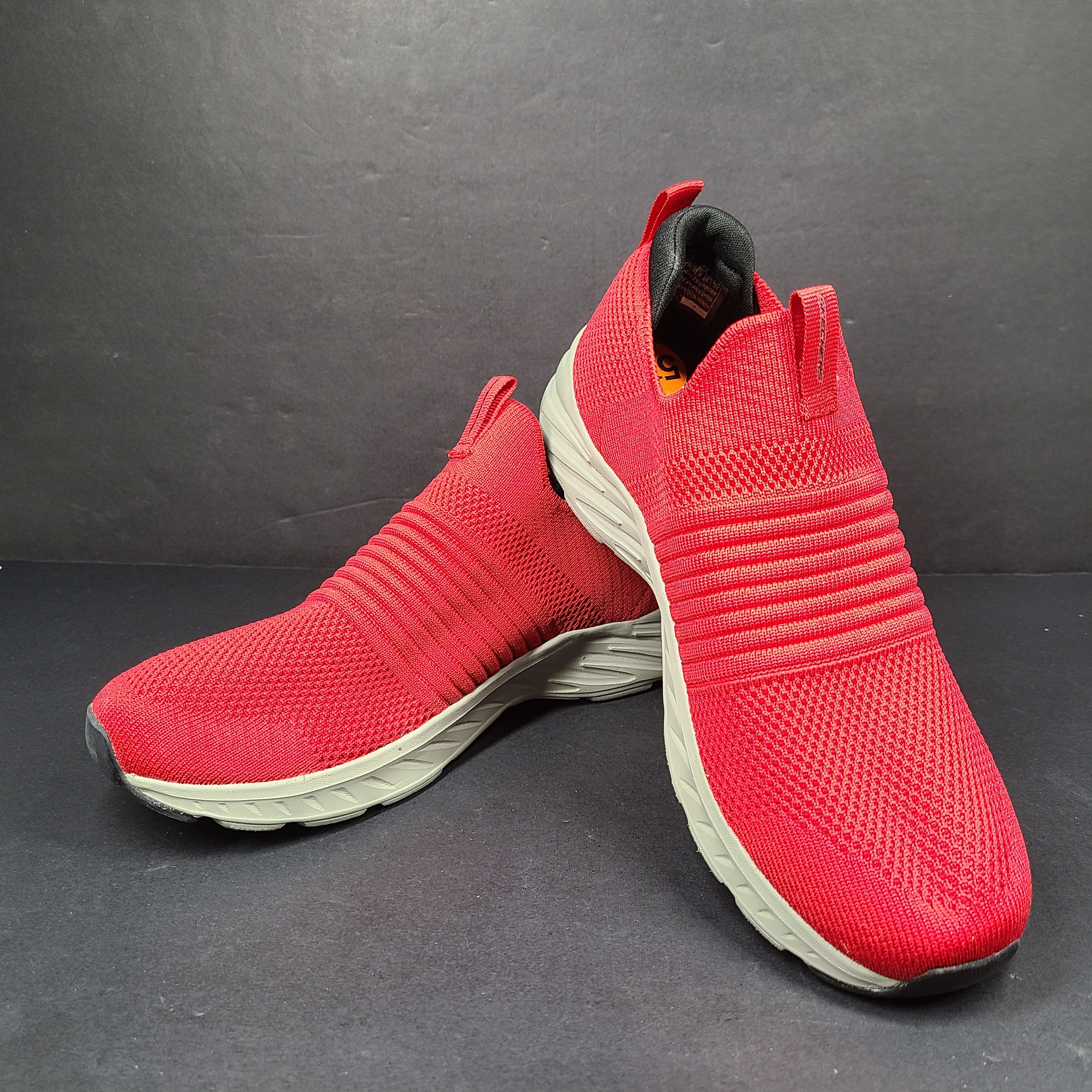 Red Skechers SKX Air-Cooled Memory Foam sneakers in US size 5.5 with cushioned support.