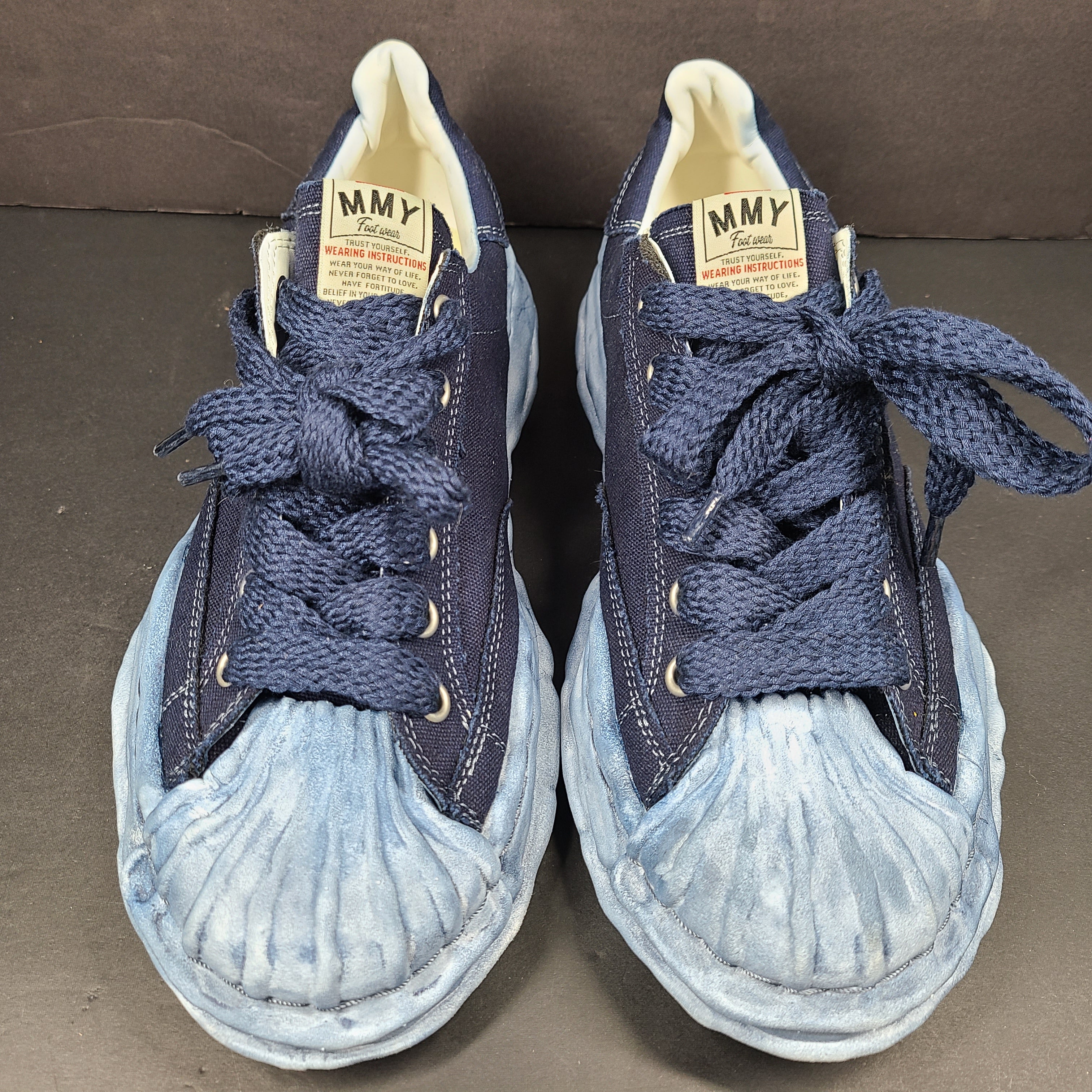 MMY Blakey low-top sneaker in blue features MMY branding on the tongue and heel and a size 44 fit.