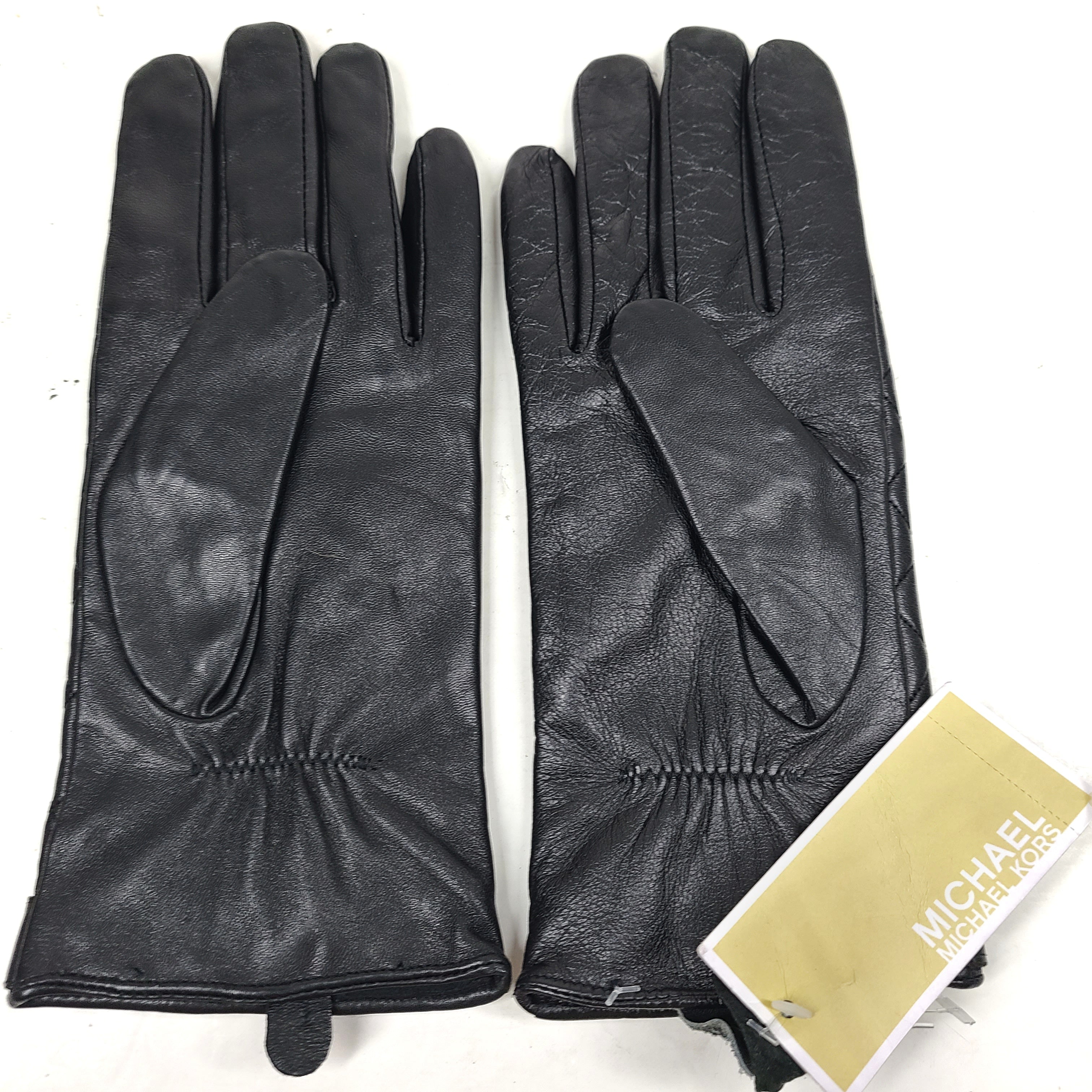 Michael Kors quilted leather gloves in black with XL sizing and refined gold-accent detail.