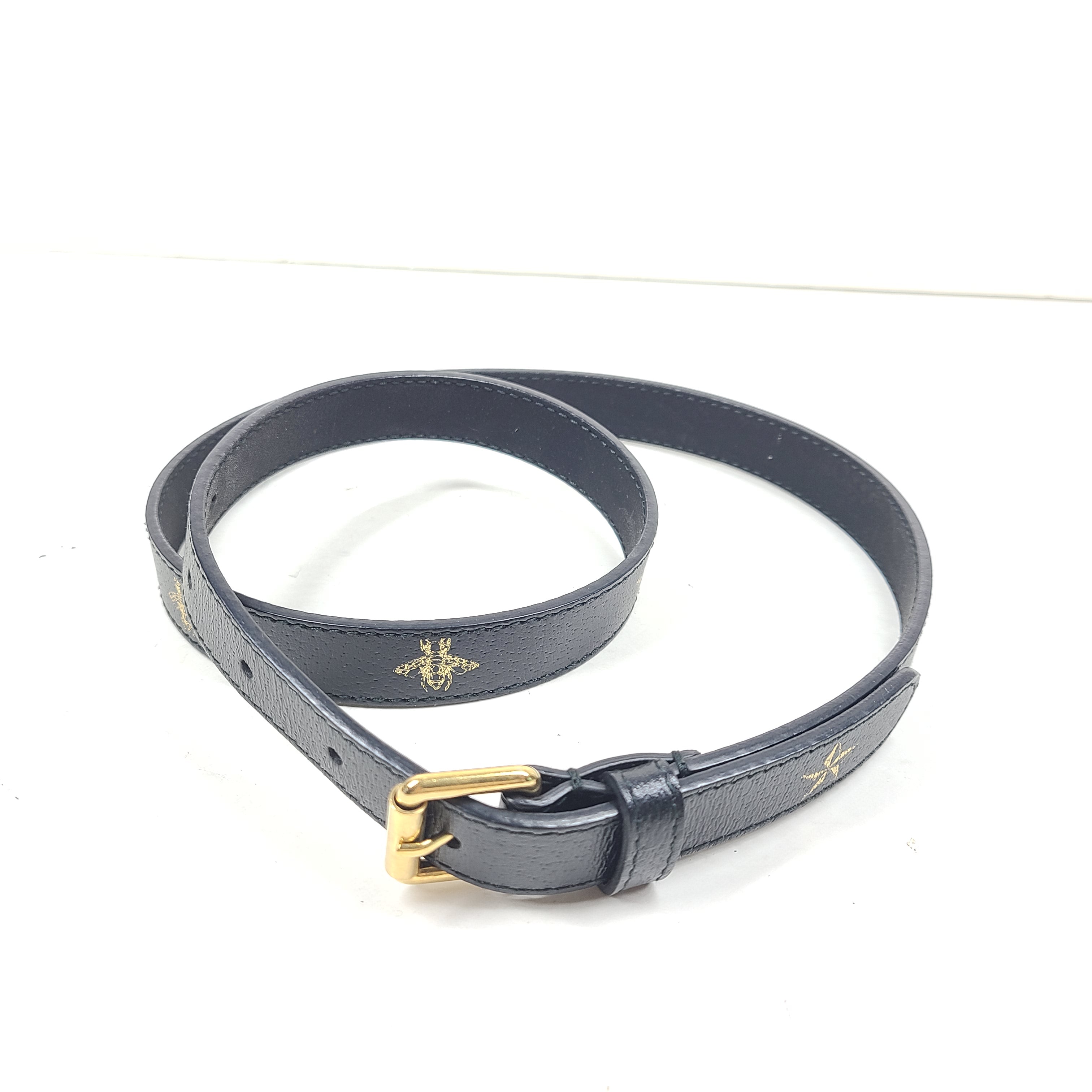 Gucci black leather belt with bee and star motifs and markings 75-30 and 430199, model 576178 DJ2TT.