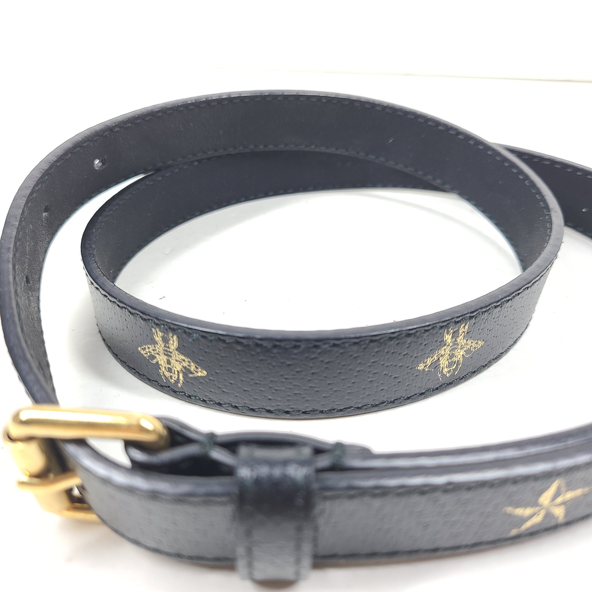 Gucci black leather belt with bee and star motifs and markings 75-30 and 430199, model 576178 DJ2TT.
