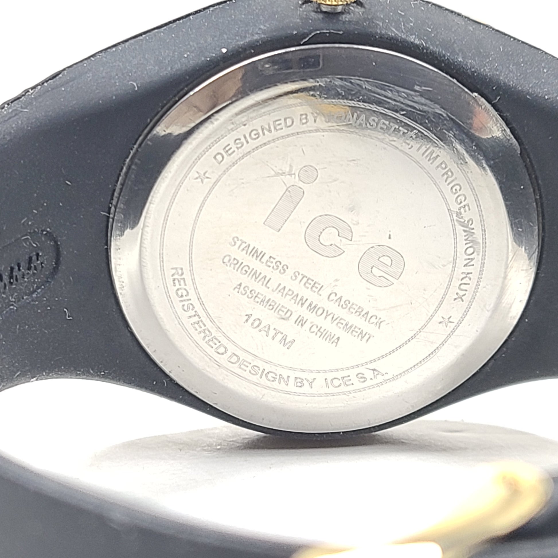 Black and gold Ice-Watch Ice Generation with stainless steel caseback, 10 ATM water resistance and Japanese movement.