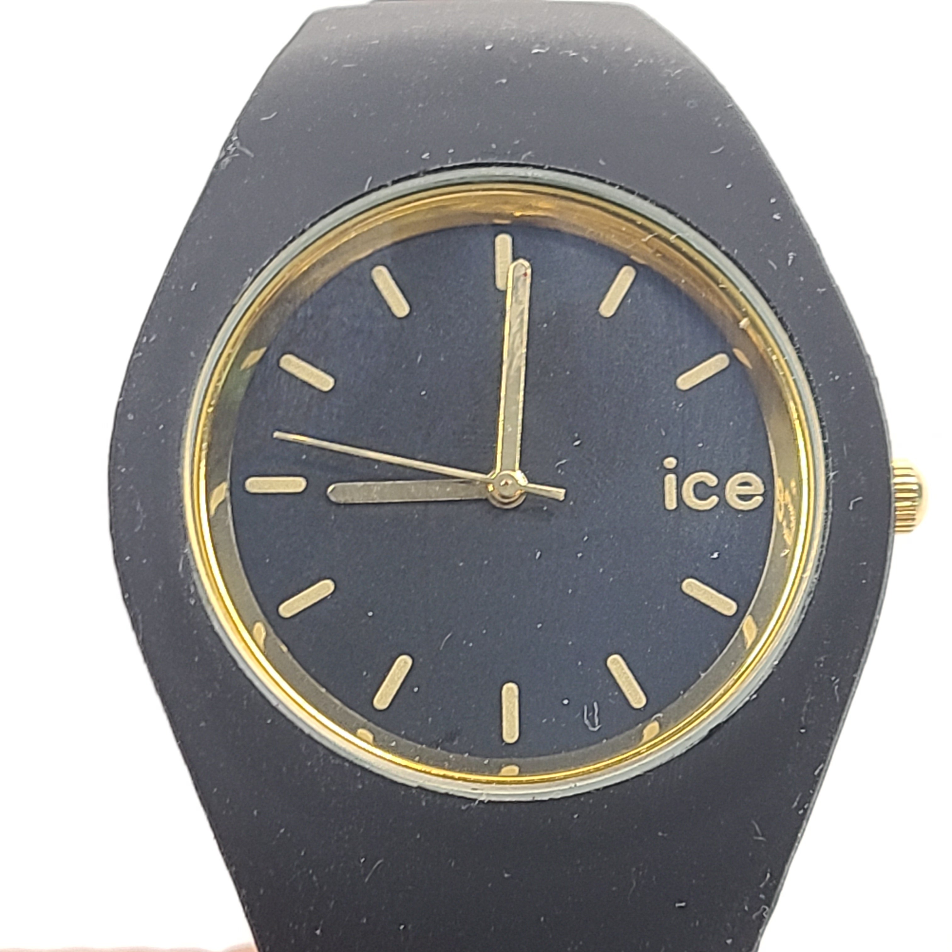 Black and gold Ice-Watch Ice Generation with stainless steel caseback, 10 ATM water resistance and Japanese movement.
