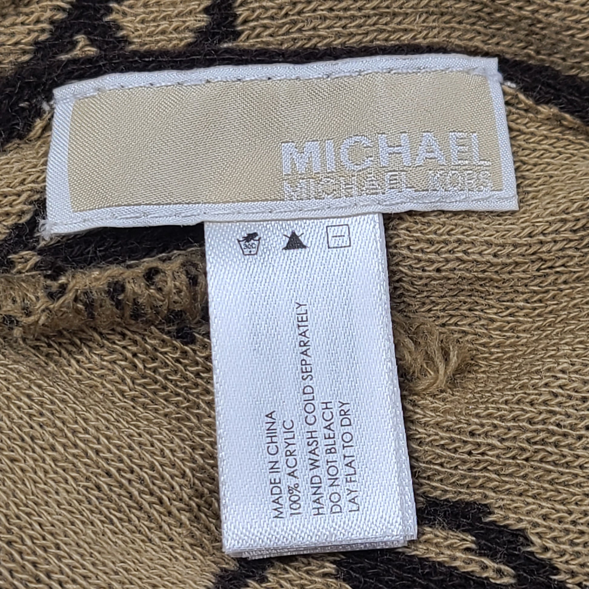 Brown and beige Michael Kors beanie with matching scarf in soft 100% acrylic fabric.