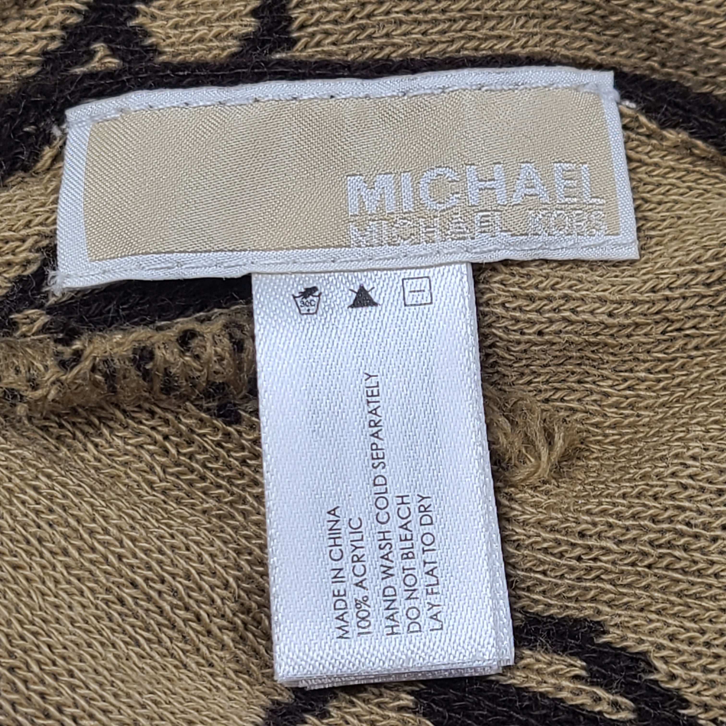 Brown and beige Michael Kors beanie with matching scarf in soft 100% acrylic fabric.