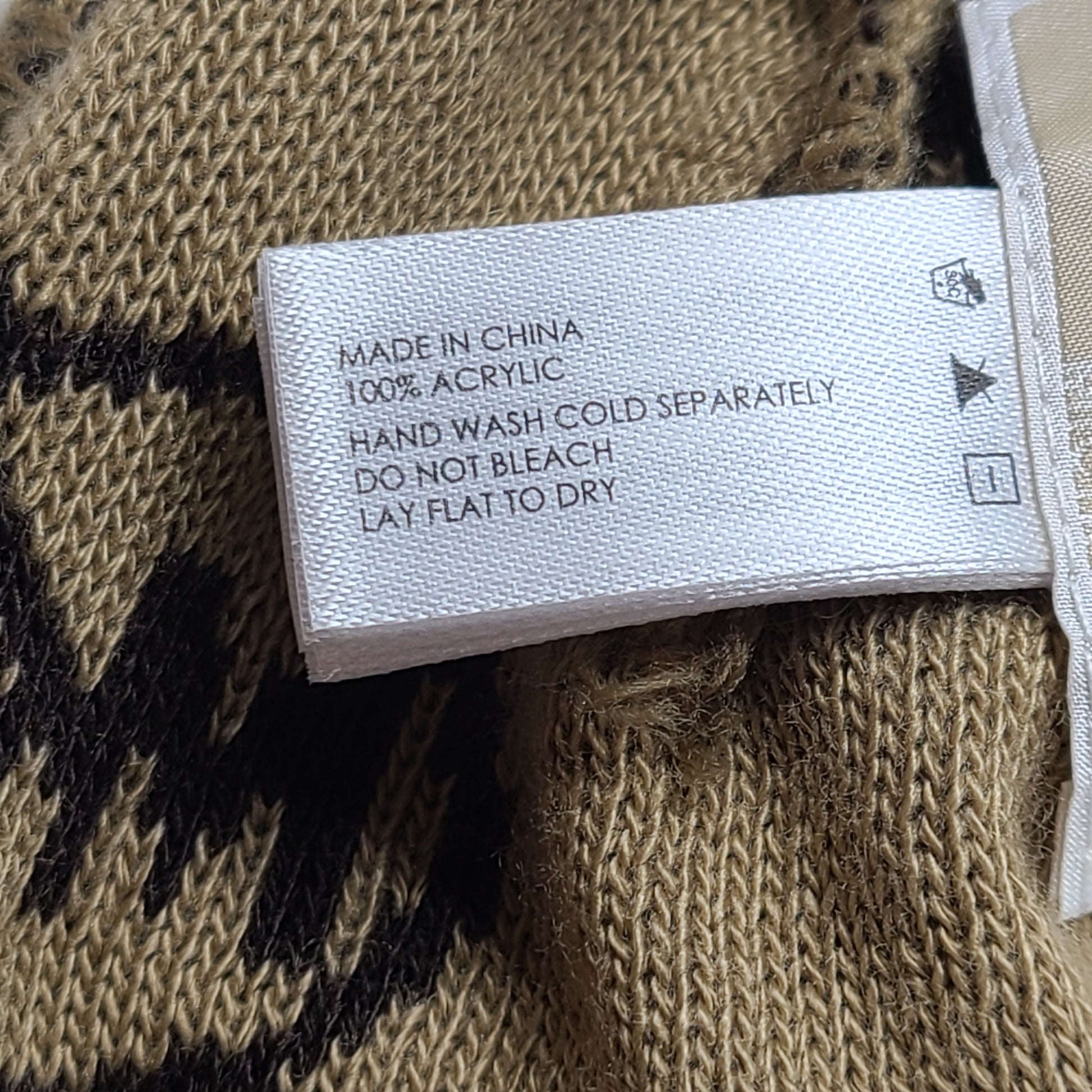 Brown and beige Michael Kors beanie with matching scarf in soft 100% acrylic fabric.