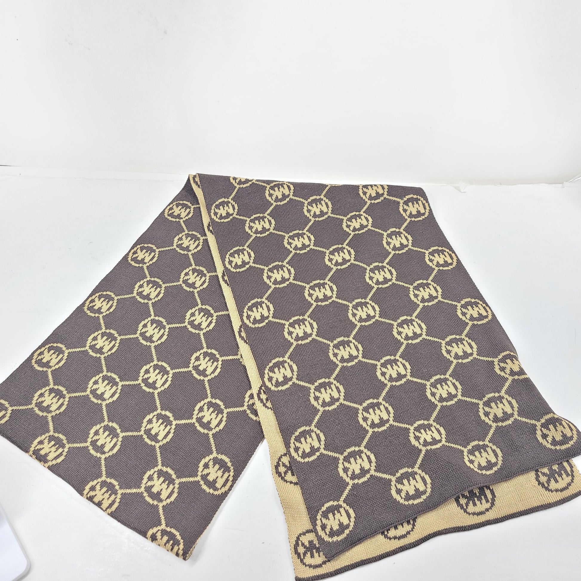 Brown and beige Michael Kors beanie with matching scarf in soft 100% acrylic fabric.